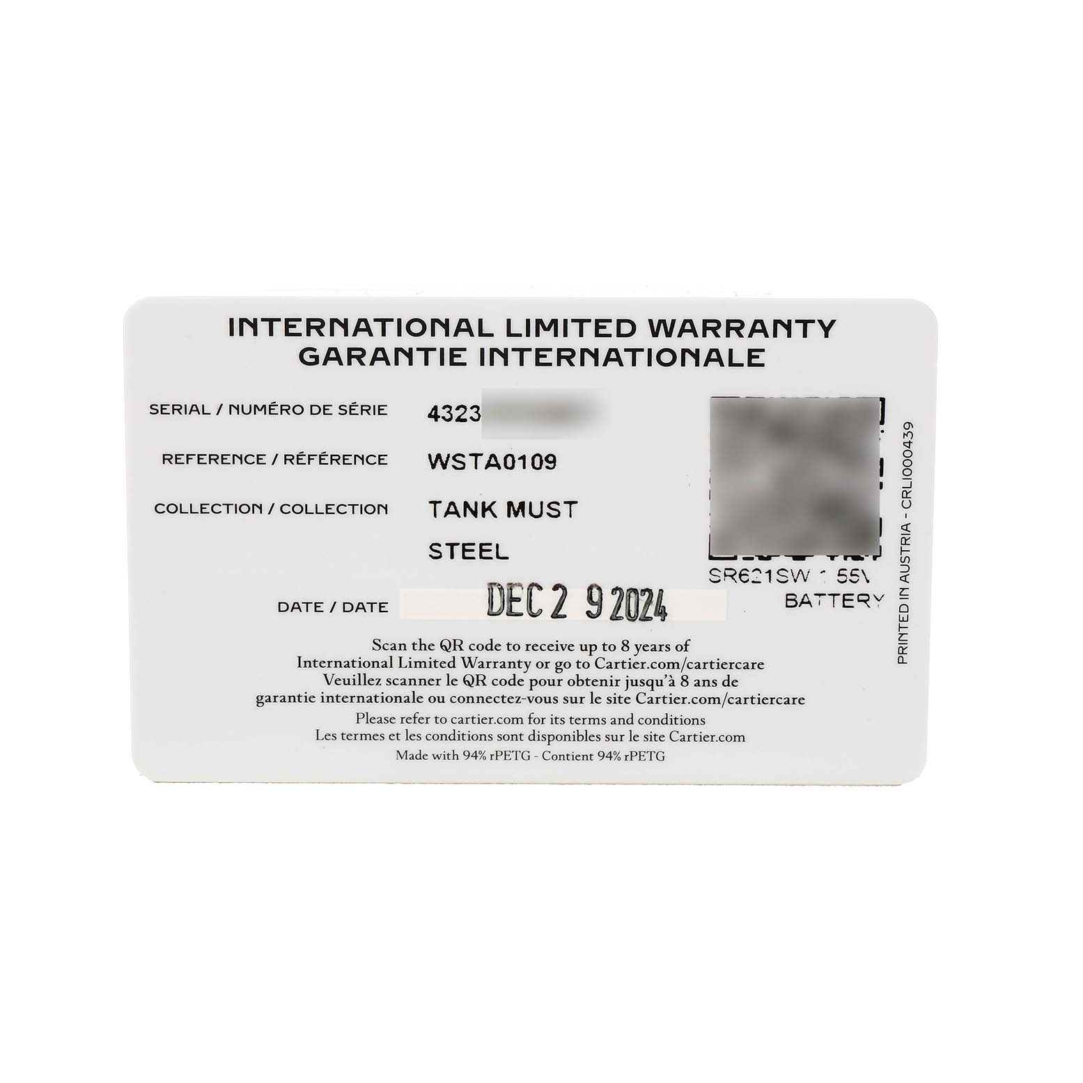 The image shows an International Limited Warranty card for the Cartier Tank Must WSTA0109 Men's Stainless Steel Silver Dial model.