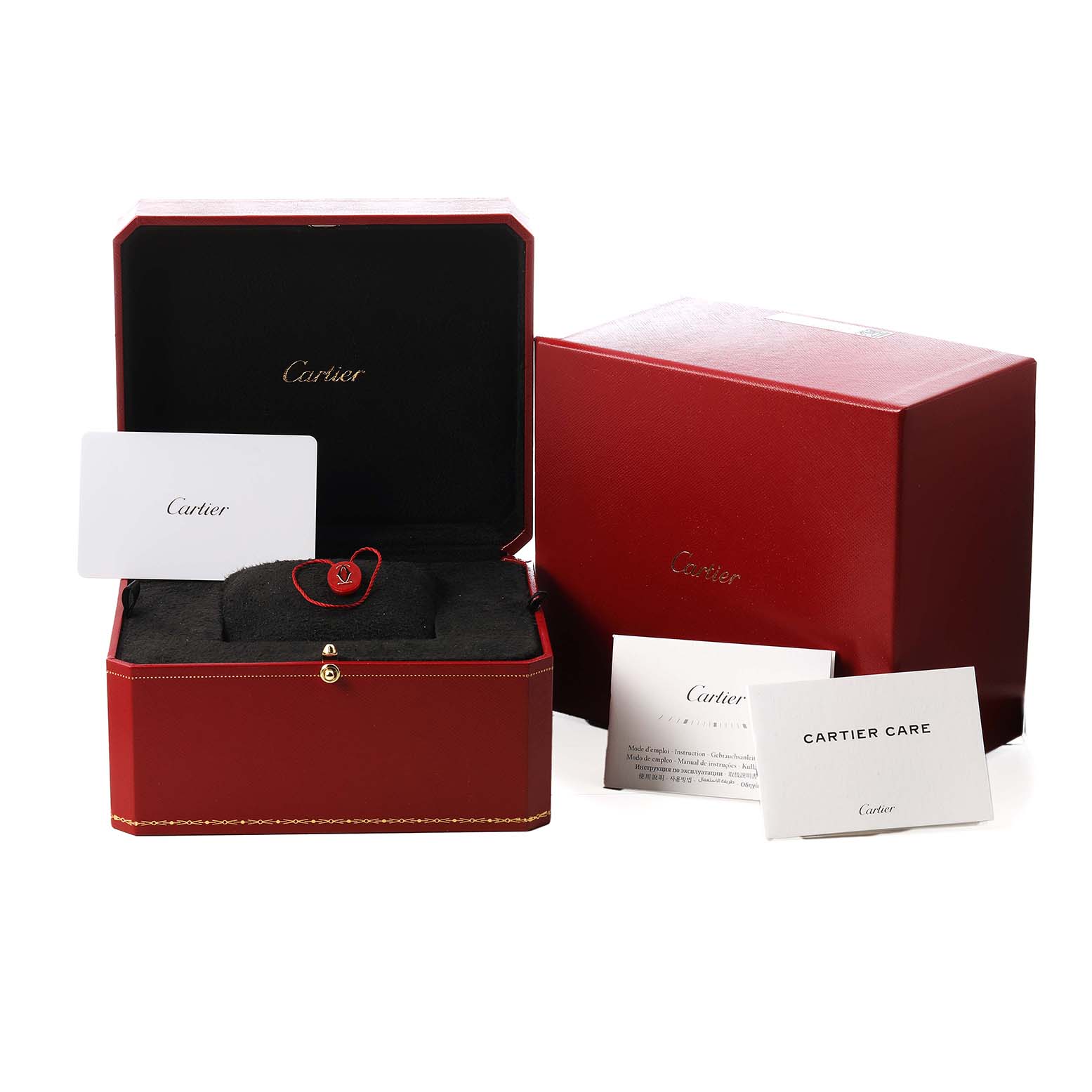 The image shows a Cartier Tank Must WSTA0109 Men's Stainless Steel Silver Dial model box with packaging and care cards.
