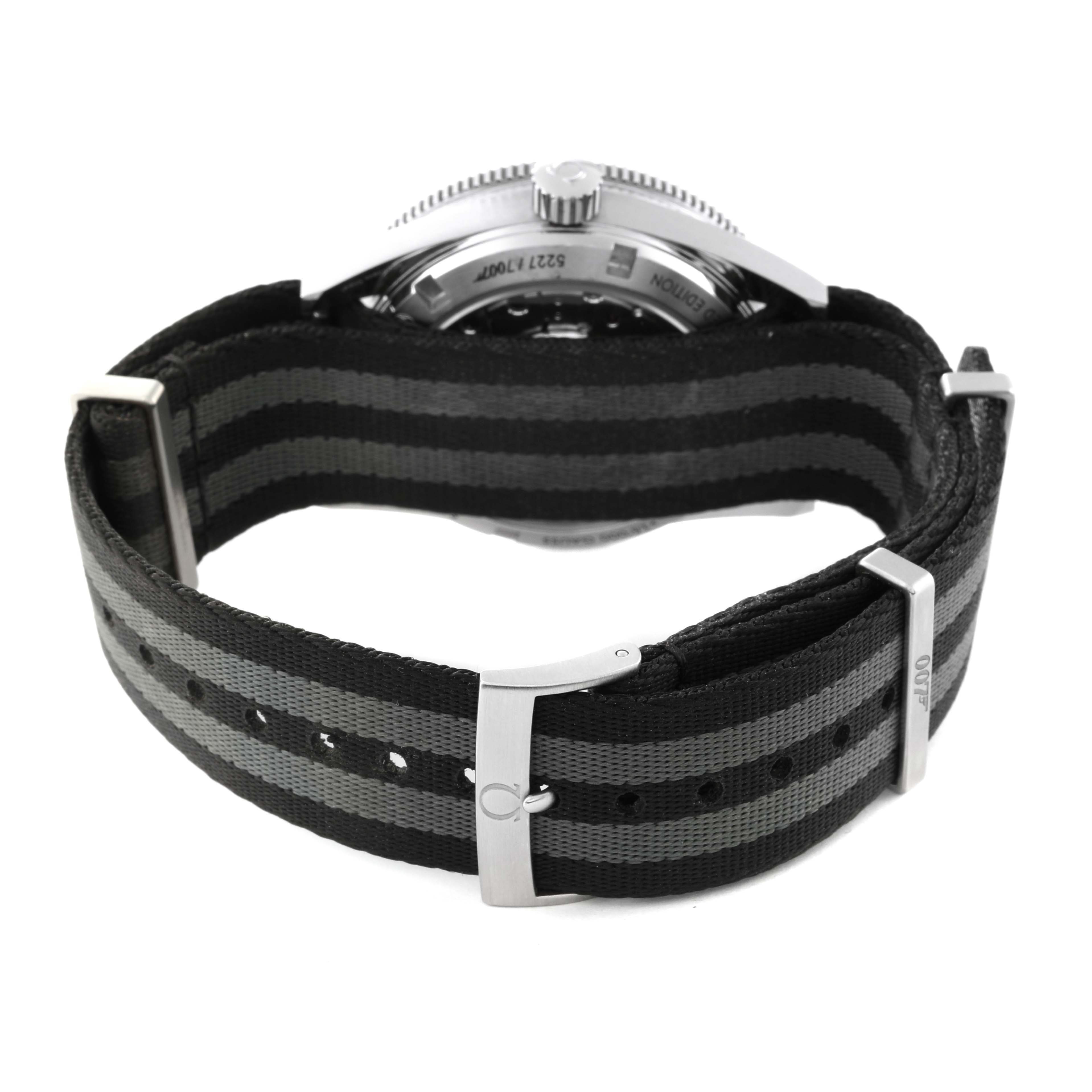 The image shows the back view of an Omega Seamaster 233.32.41.21.01.001 Men's Stainless Steel Black Dial 233.32.41.21.01.001 Men's Stainless Steel Black Dial watch, focusing on its black and gray striped NATO strap and clasp.