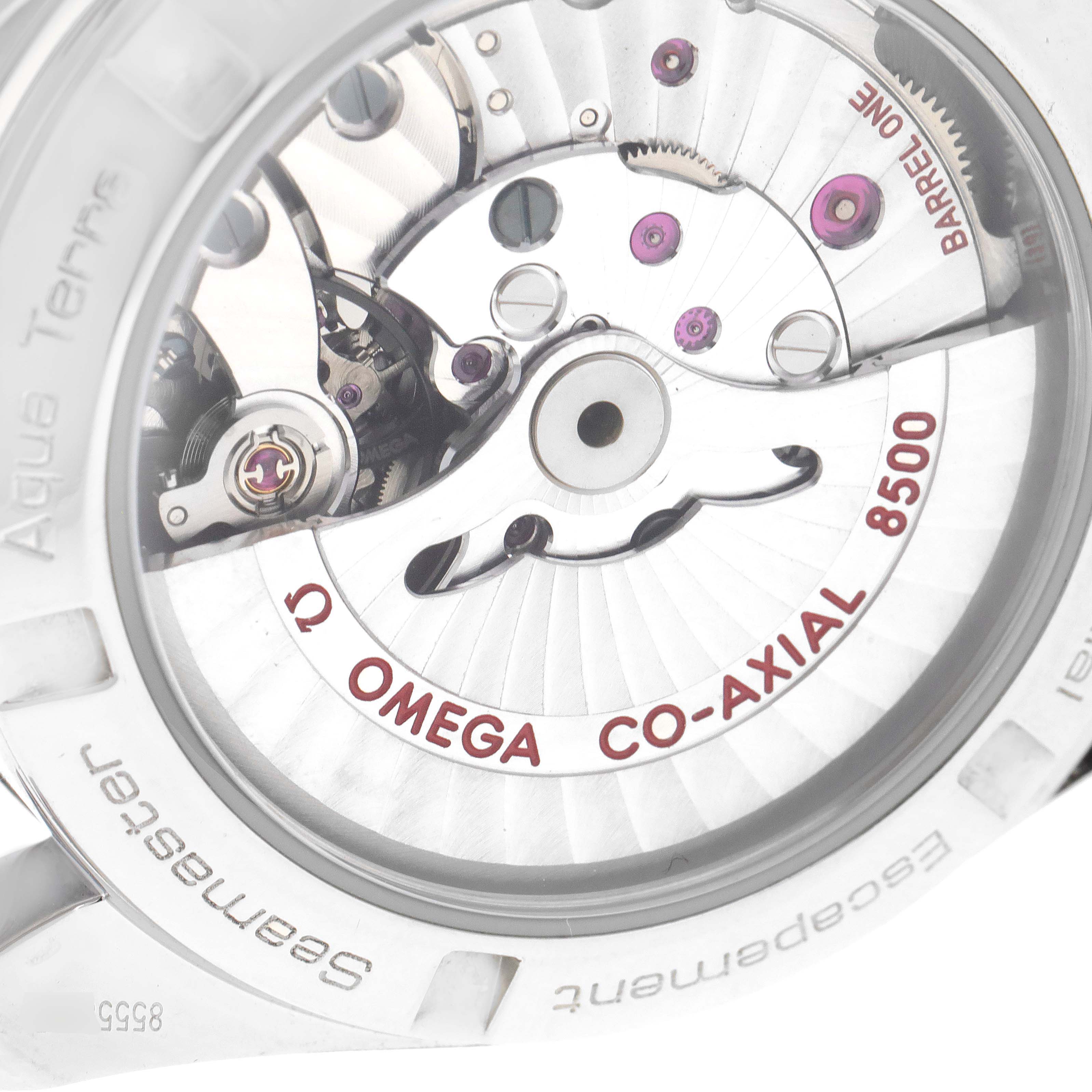 The image shows the back of an Omega Aqua Terra 231.10.39.21.02.001 Men
s Stainless Steel Silver Dial 231.10.39.21.02.001 Men
s Stainless Steel Silver Dial watch, highlighting its Co-Axial 8500 movement.