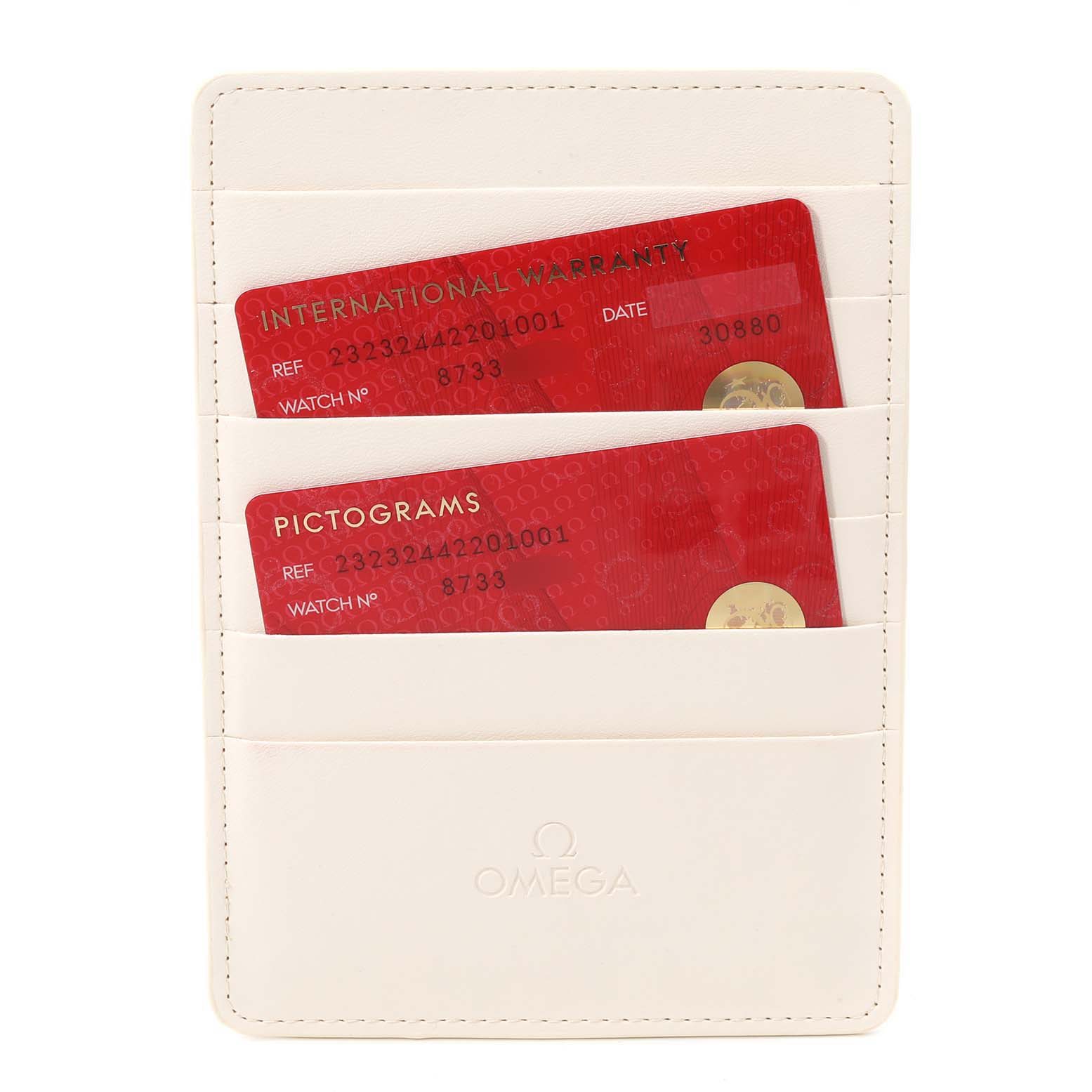 The image shows an Omega Planet Ocean 232.30.44.22.01.001 Men's Stainless Steel Black Dial 232.30.44.22.01.001 Men's Stainless Steel Black Dial model cardholder containing an International Warranty card and a Pictograms card.