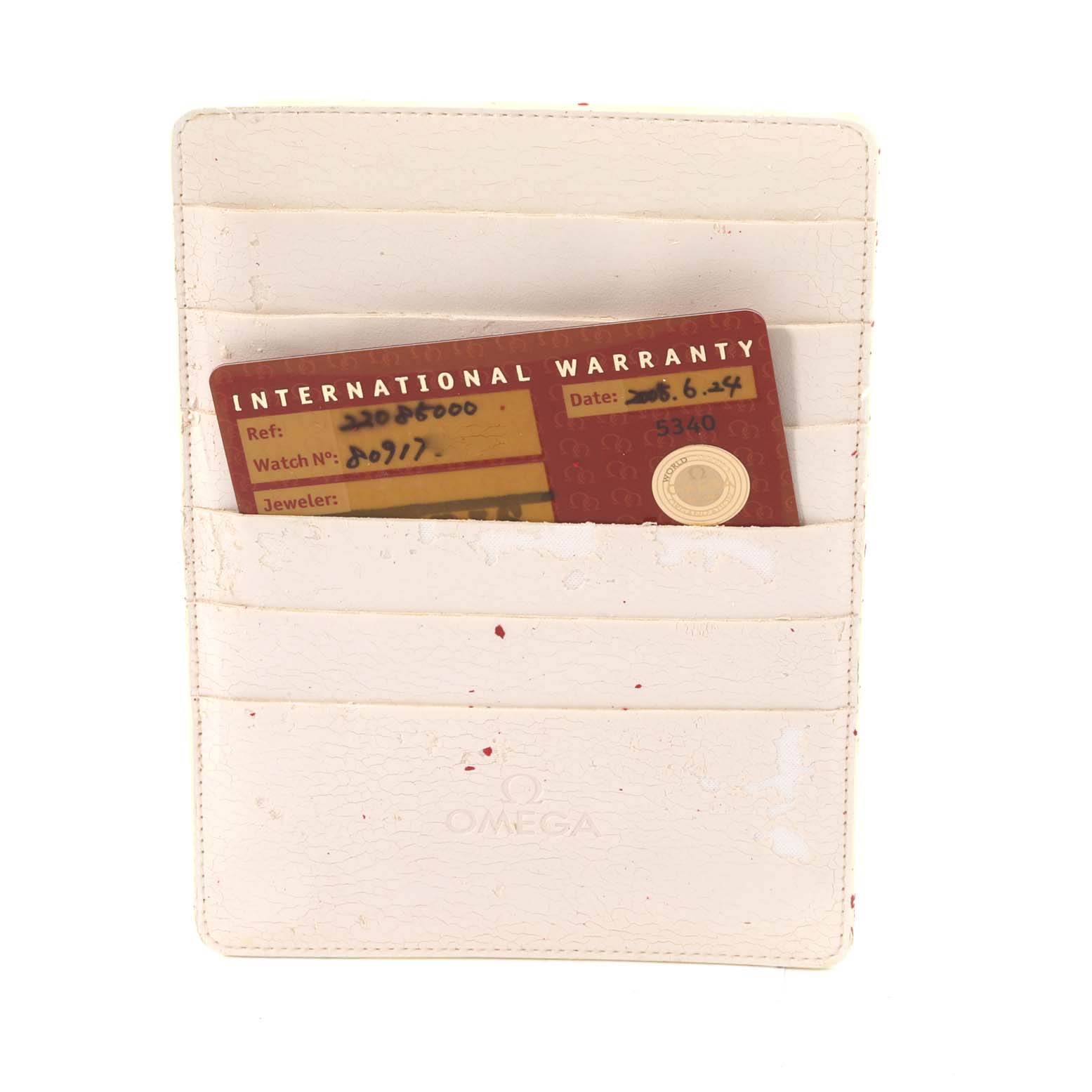 The image shows an Omega Planet Ocean 2208.50.00 Men
s Stainless Steel Black Dial 2208.50.00 Men
s Stainless Steel Black Dial
s international warranty card in a white card holder.