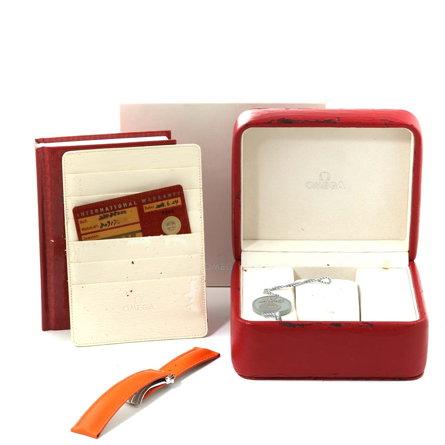 The image shows an Omega Planet Ocean 2208.50.00 Men
s Stainless Steel Black Dial 2208.50.00 Men
s Stainless Steel Black Dial watch
s red box, an international warranty card, and an orange watch strap.