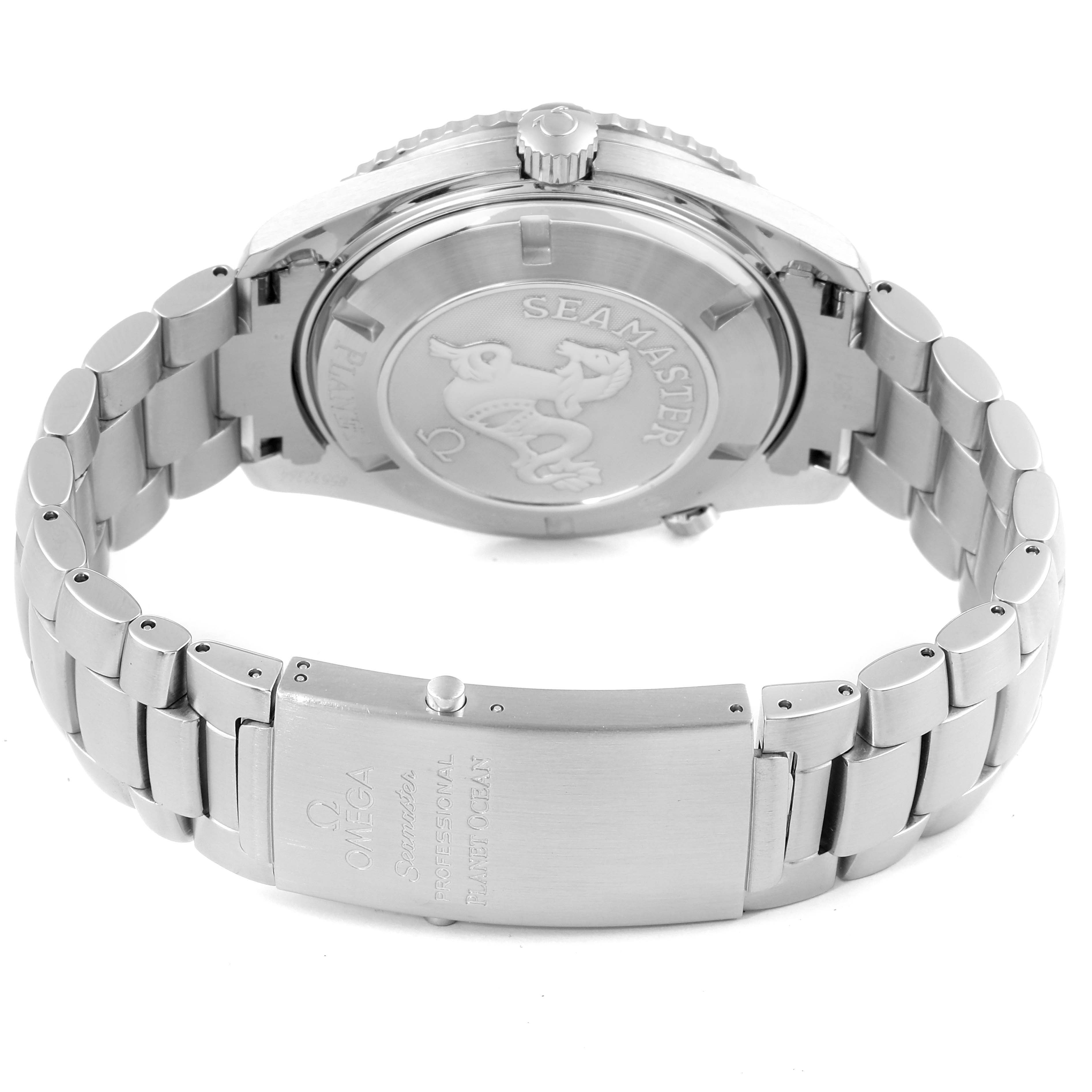 The image shows the back and clasp of the Omega Planet Ocean 2208.50.00 Men's Stainless Steel Black Dial 2208.50.00 Men's Stainless Steel Black Dial watch, with details on the case back and bracelet.