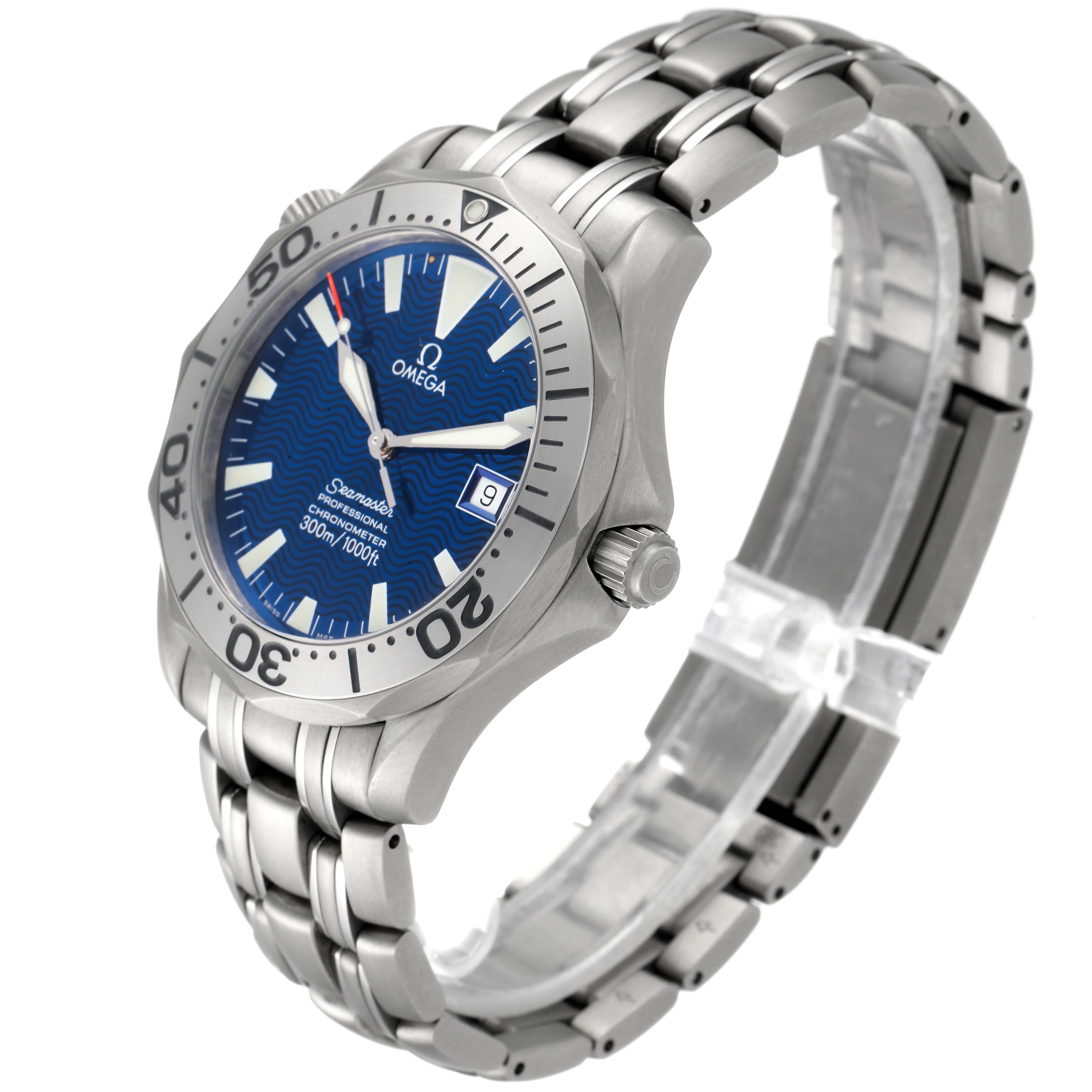 The Omega Seamaster 2231.80.00 Men's Titanium Blue Dial 2231.80.00 Men's Titanium Blue Dial watch is shown at an oblique angle, highlighting its blue dial, bezel, crown, and stainless steel bracelet.
