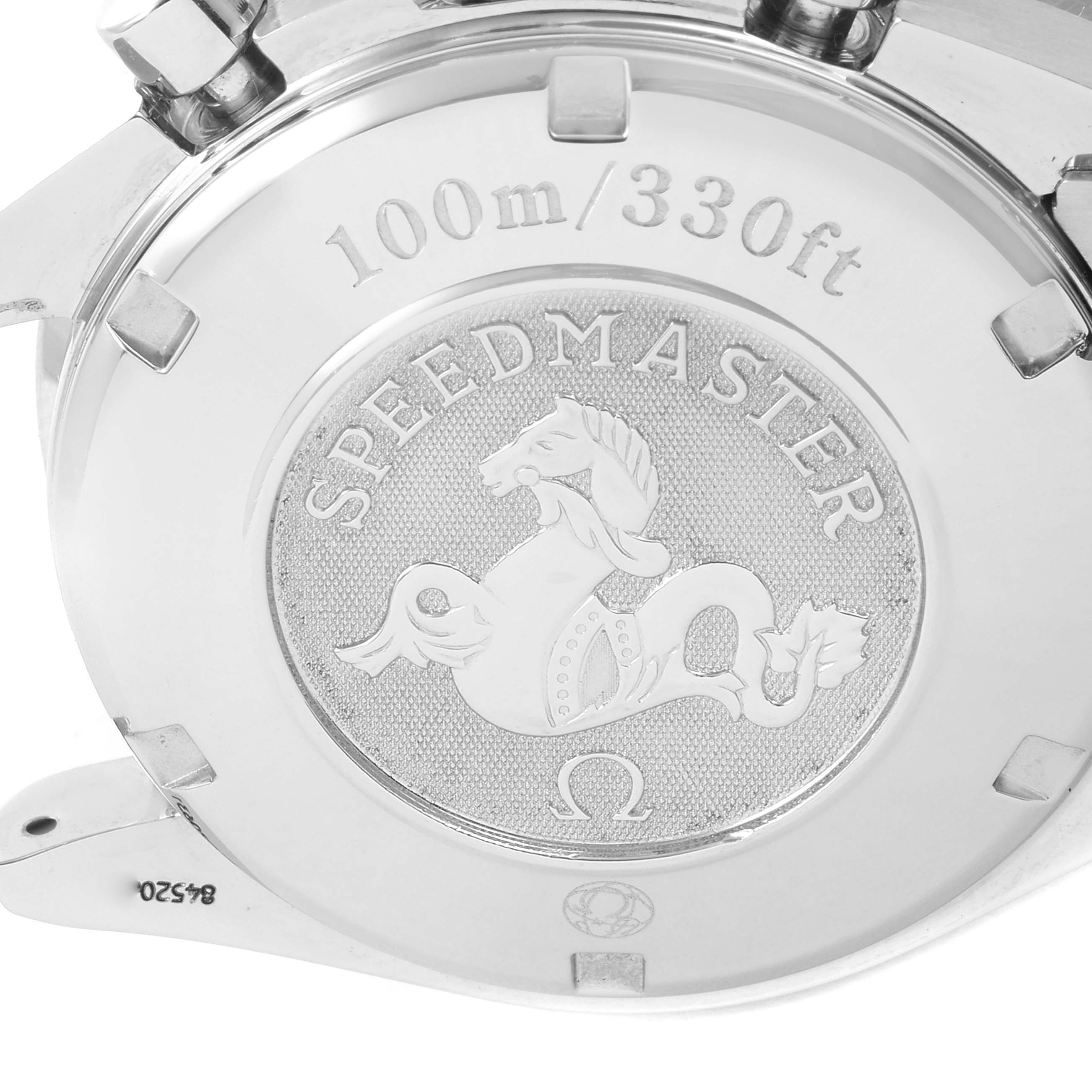 The image shows the case back of an Omega Speedmaster 3210.51.00 Men's Stainless Steel Black Dial 3210.51.00 Men's Stainless Steel Black Dial watch, highlighting its engraved logo and water resistance markings.