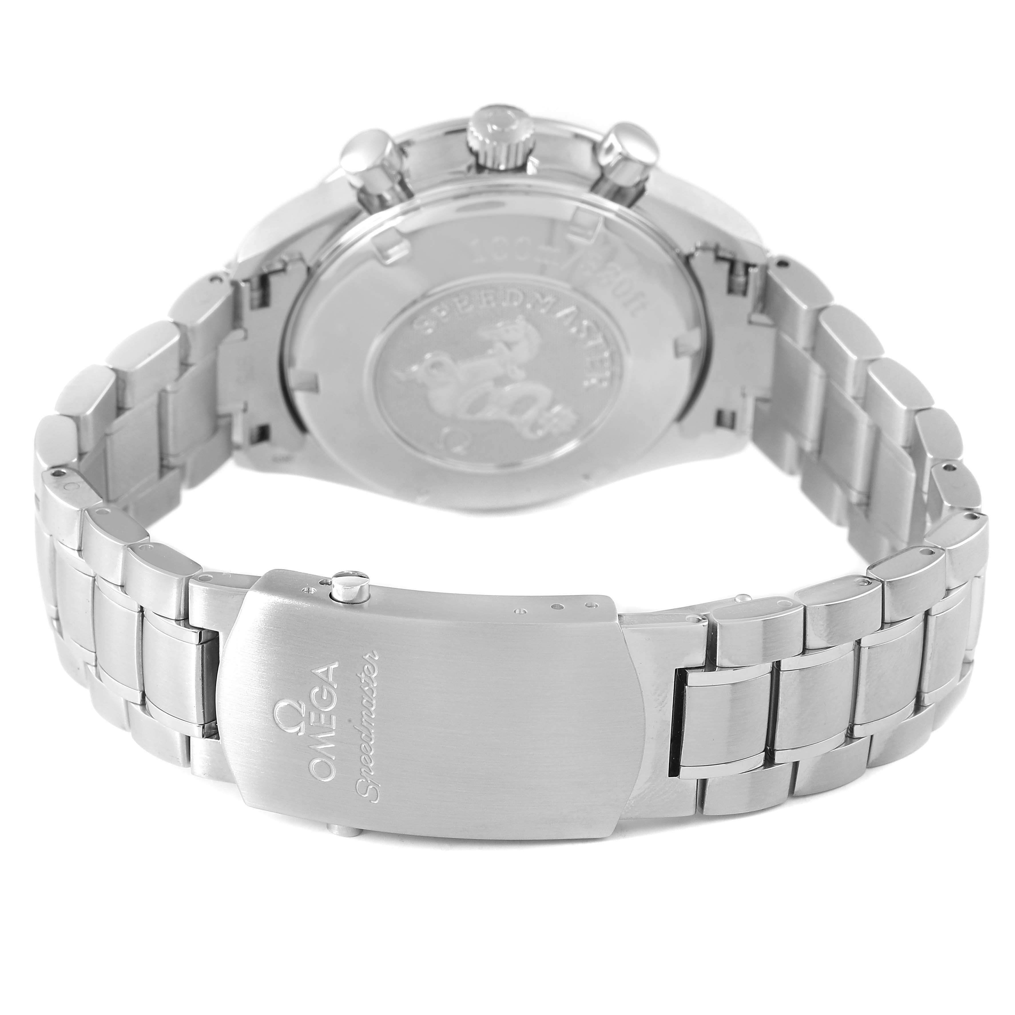 The image shows the Omega Speedmaster 3210.51.00 Men's Stainless Steel Black Dial watch from the back, highlighting its clasp, bracelet, and engraved case back.