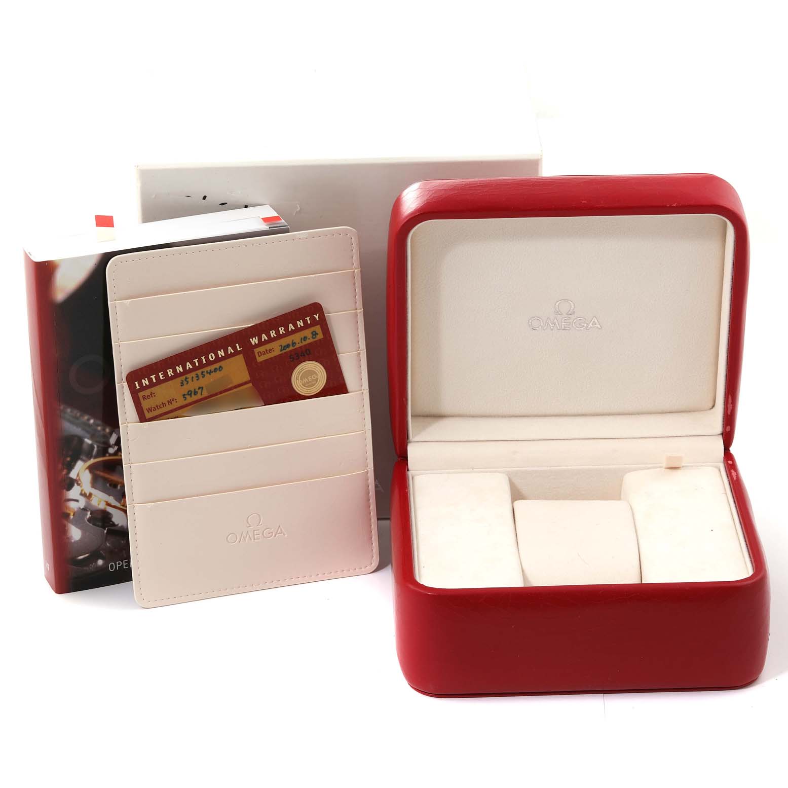 The image shows an Omega Speedmaster 3513.54.00 Men
s Stainless Steel Black Dial 3513.54.00 Men
s Stainless Steel Black Dial watch box, an international warranty cardholder, and a user manual.