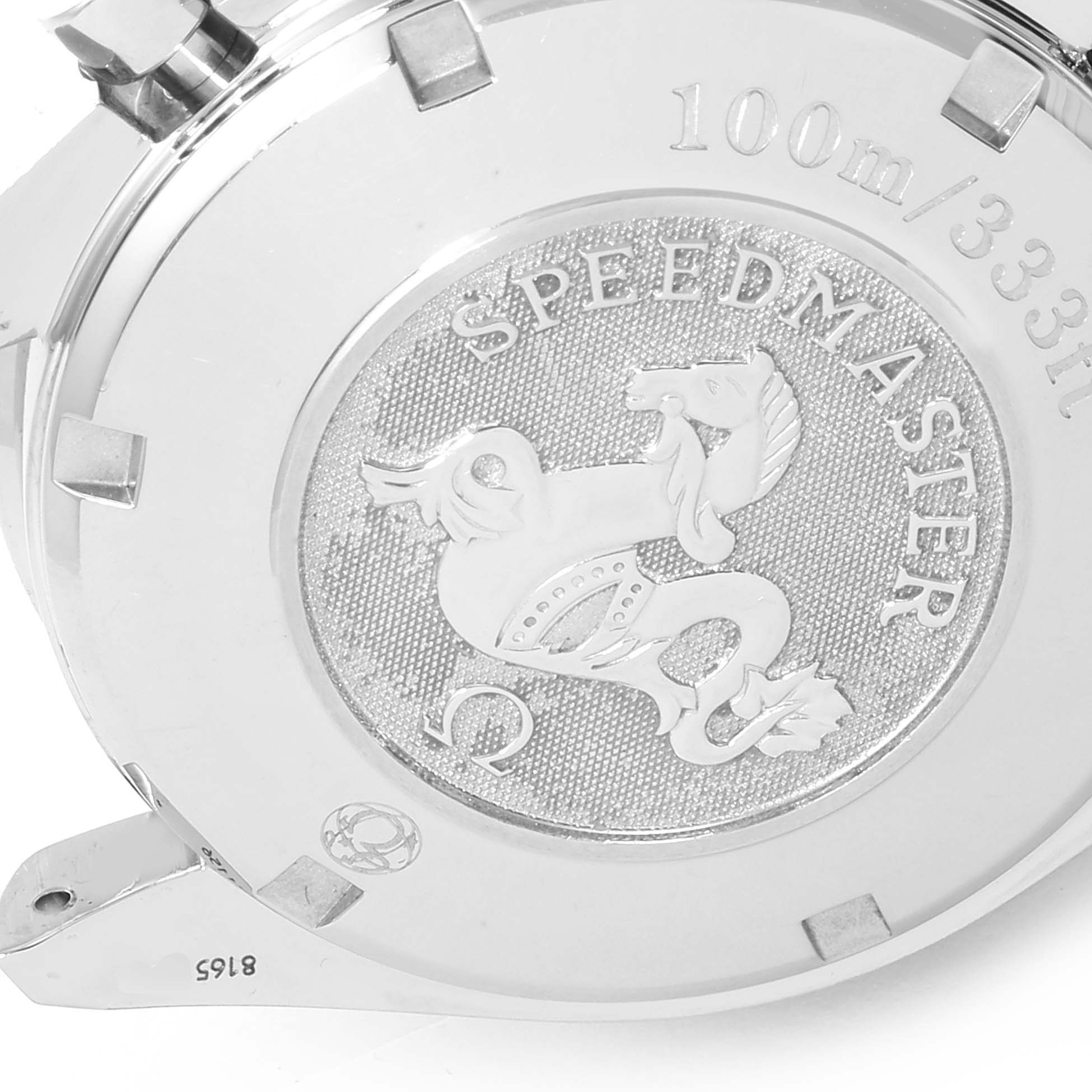 The image shows the back case of an Omega Speedmaster 3212.80.00 Men
s Stainless Steel Blue Dial 3212.80.00 Men
s Stainless Steel Blue Dial watch with engraved details and water resistance information.