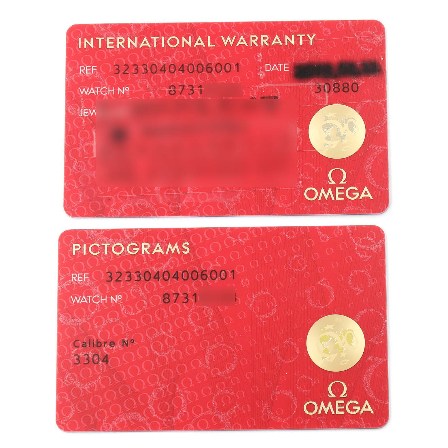 The image shows the international warranty and pictogram cards for an Omega Speedmaster 323.30.40.40.06.001 Men's Stainless Steel Grey Dial 323.30.40.40.06.001 Men's Stainless Steel Grey Dial watch.