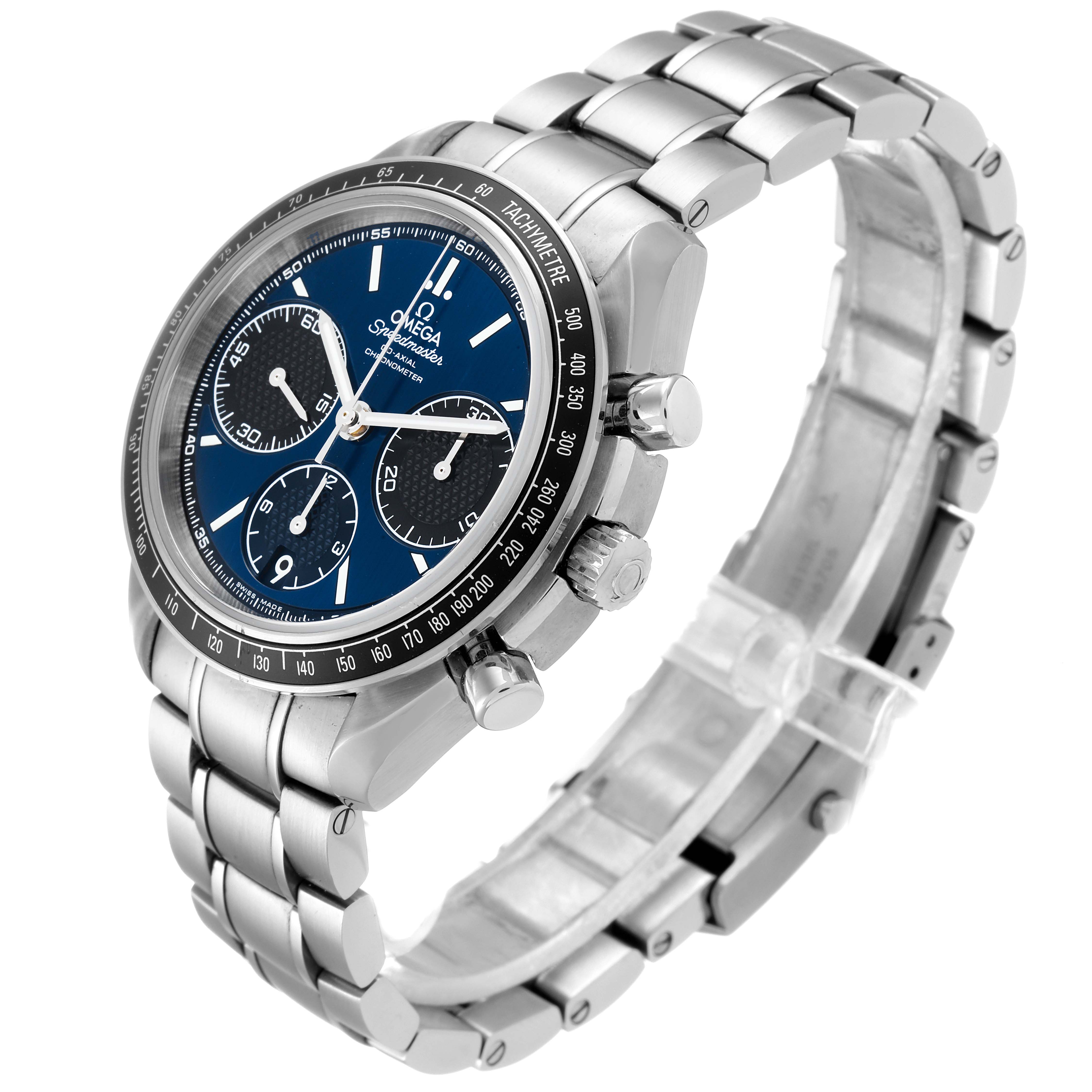 The image shows a left-front angle of the Omega Speedmaster 326.30.40.50.03.001 Men
s Stainless Steel Blue Dial 326.30.40.50.03.001 Men
s Stainless Steel Blue Dial watch, highlighting its stainless steel bracelet, chronograph dials, and tachymeter bezel.