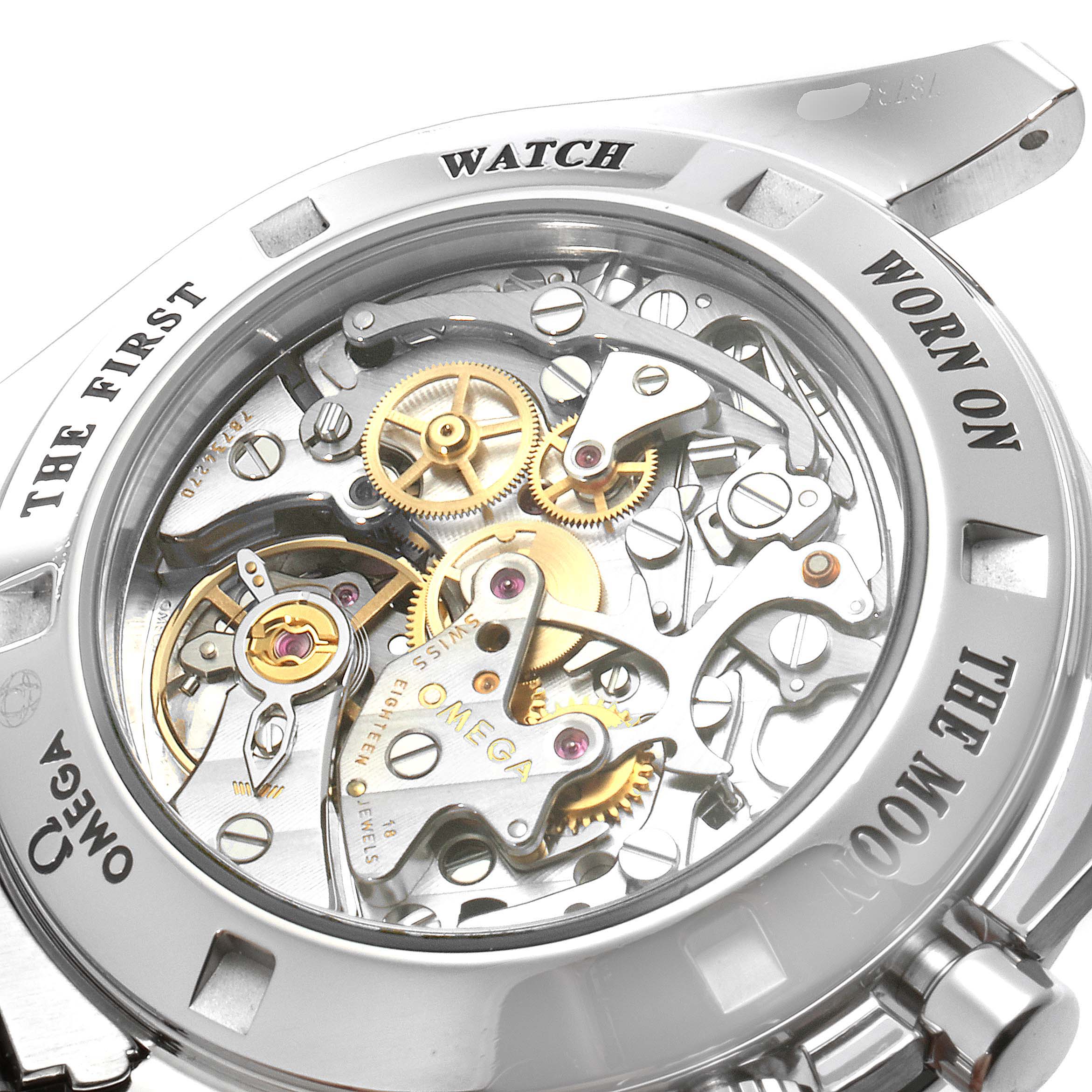 The image shows the Omega Speedmaster 3573.50.00 Men
s Stainless Steel Black Dial 3573.50.00 Men
s Stainless Steel Black Dial watch from the back, revealing intricate inner mechanisms and engravings.