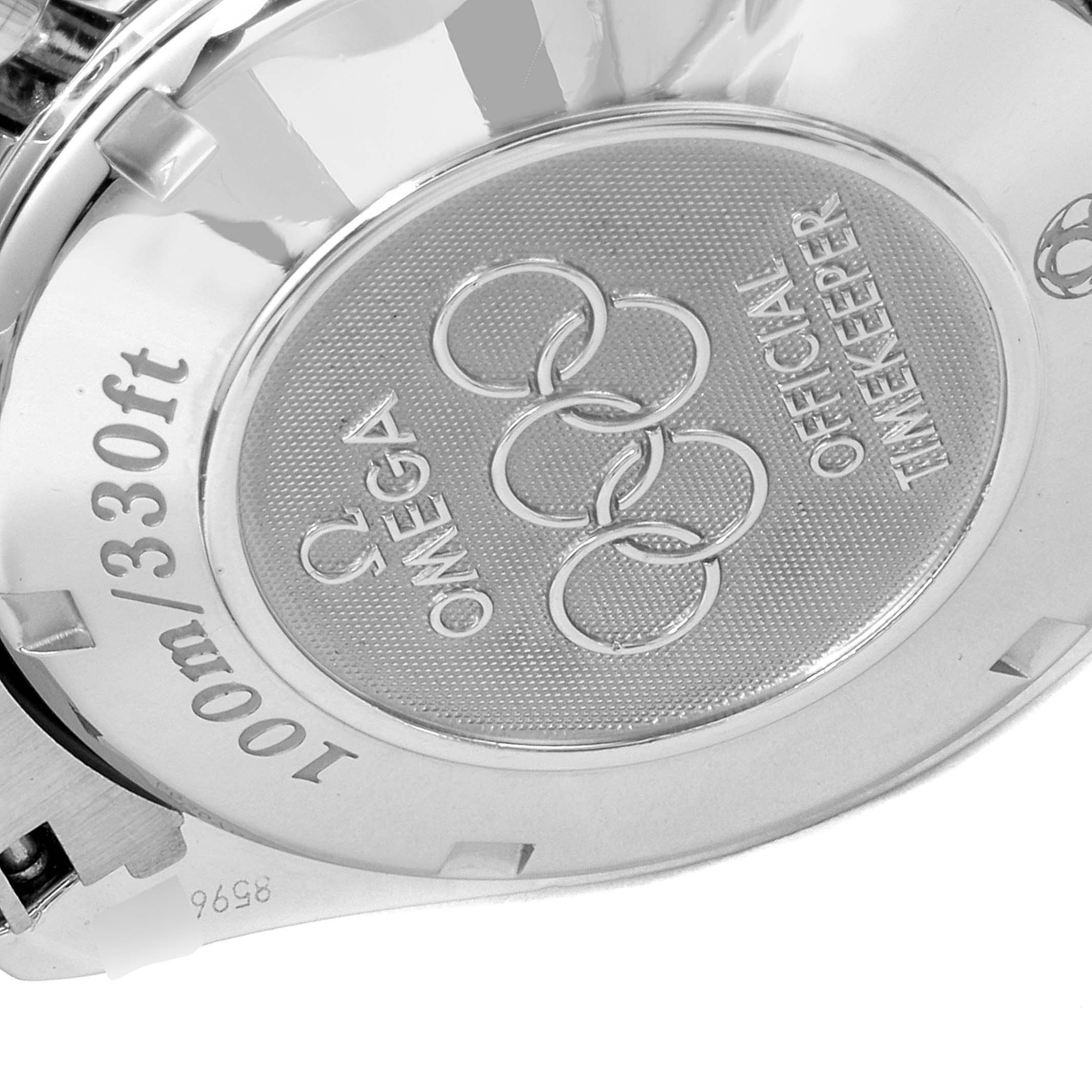 The image shows the case back of an Omega Speedmaster 323.10.40.40.04.001 Men's Stainless Steel White Dial 323.10.40.40.04.001 Men's Stainless Steel White Dial watch, highlighting its water resistance and official timekeeper engraving.