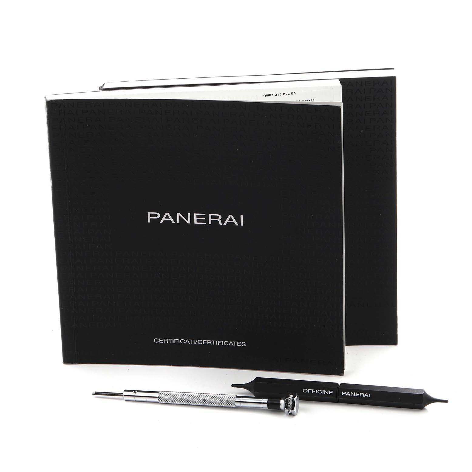 The image shows Panerai Luminor PAM00321 Men's Stainless Steel Black Dial PAM00321 Men's Stainless Steel Black Dial model accessories, including a certificate booklet and tools, viewed from above.