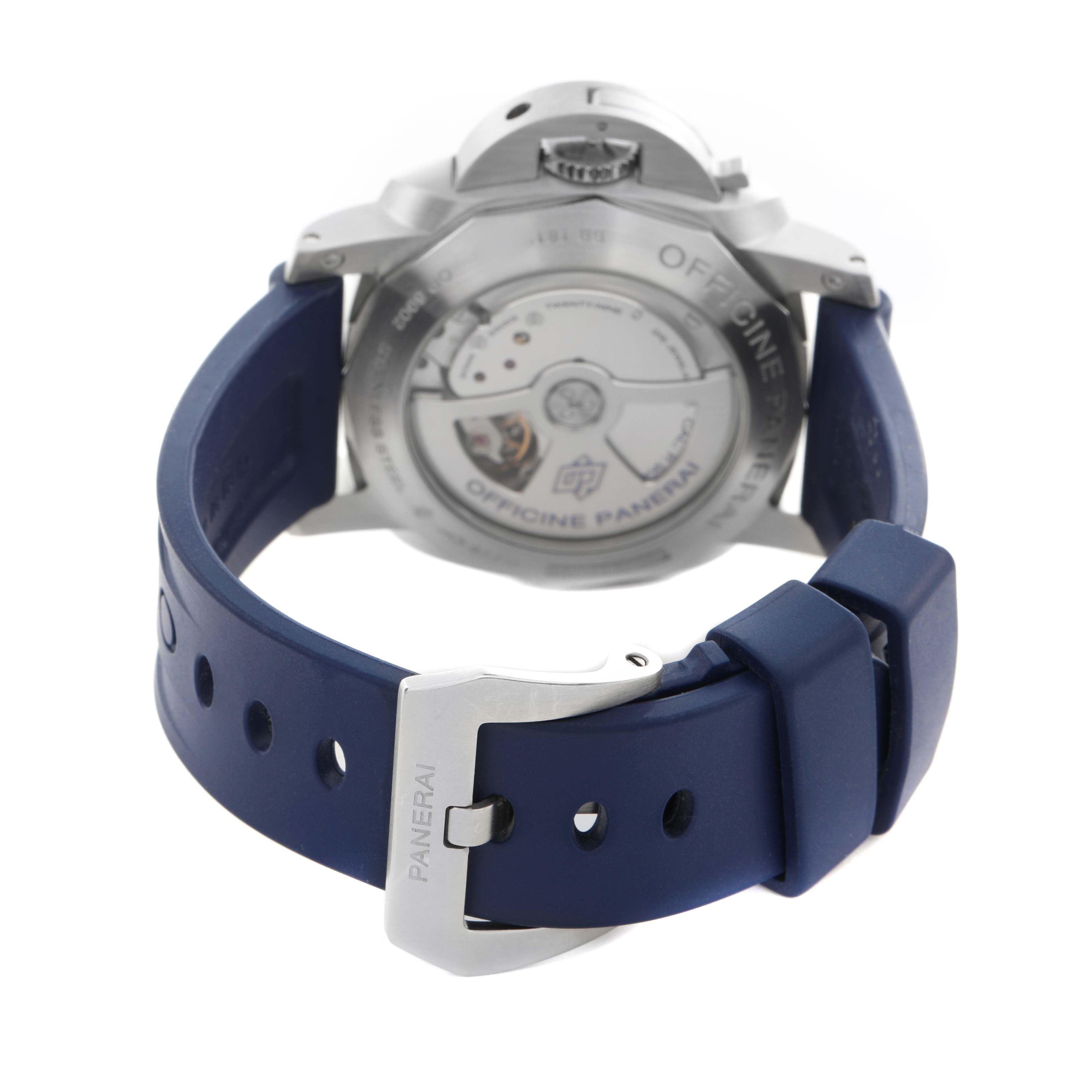 The image shows the back of a Panerai Luminor PAM00321 Men's Stainless Steel Black Dial PAM00321 Men's Stainless Steel Black Dial watch, highlighting its open caseback and a blue strap with a buckle.