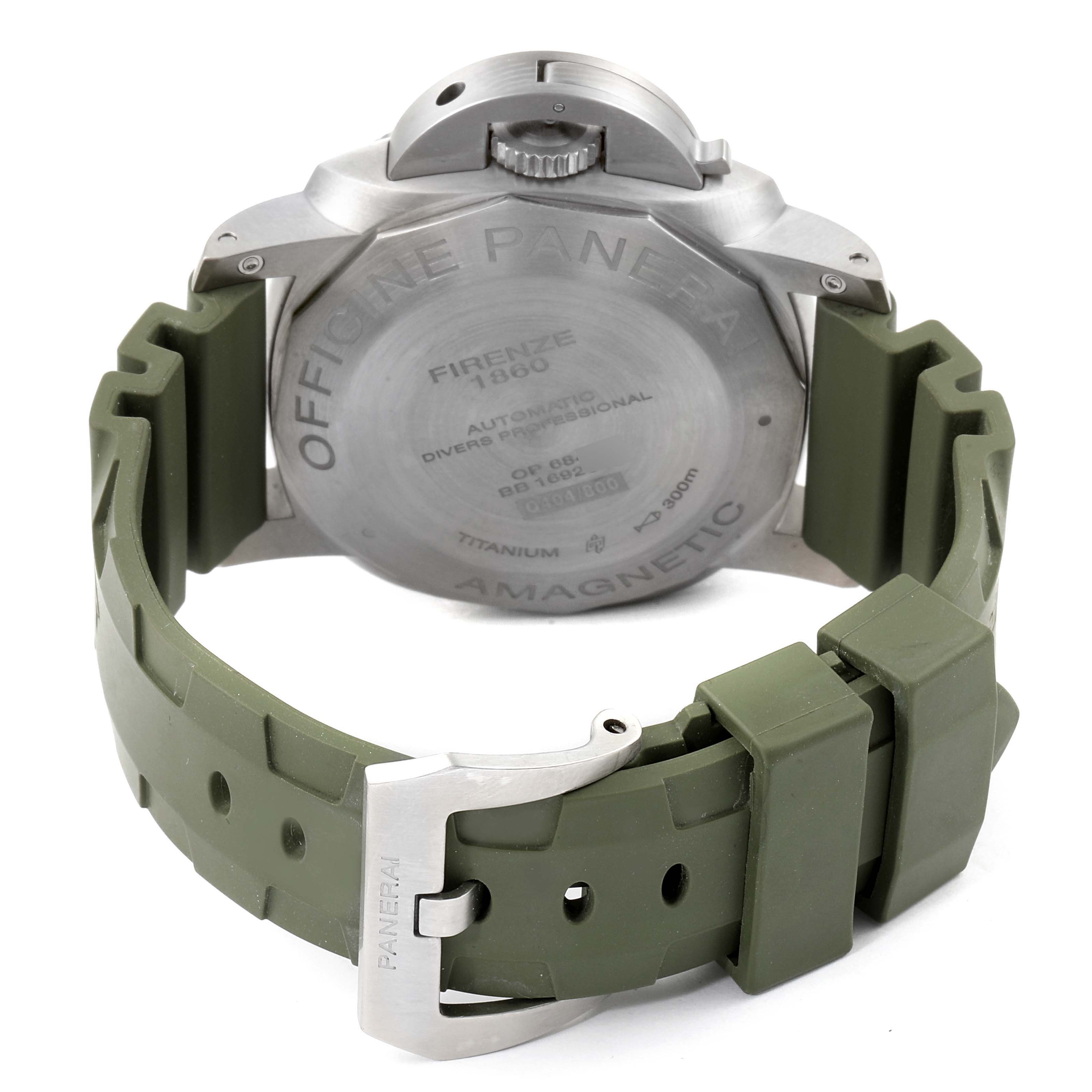 The image shows the back and clasp of a green-strapped Panerai Submersible PAM00389 Men's Titanium Black Dial PAM00389 Men's Titanium Black Dial watch with engravings on the case back.