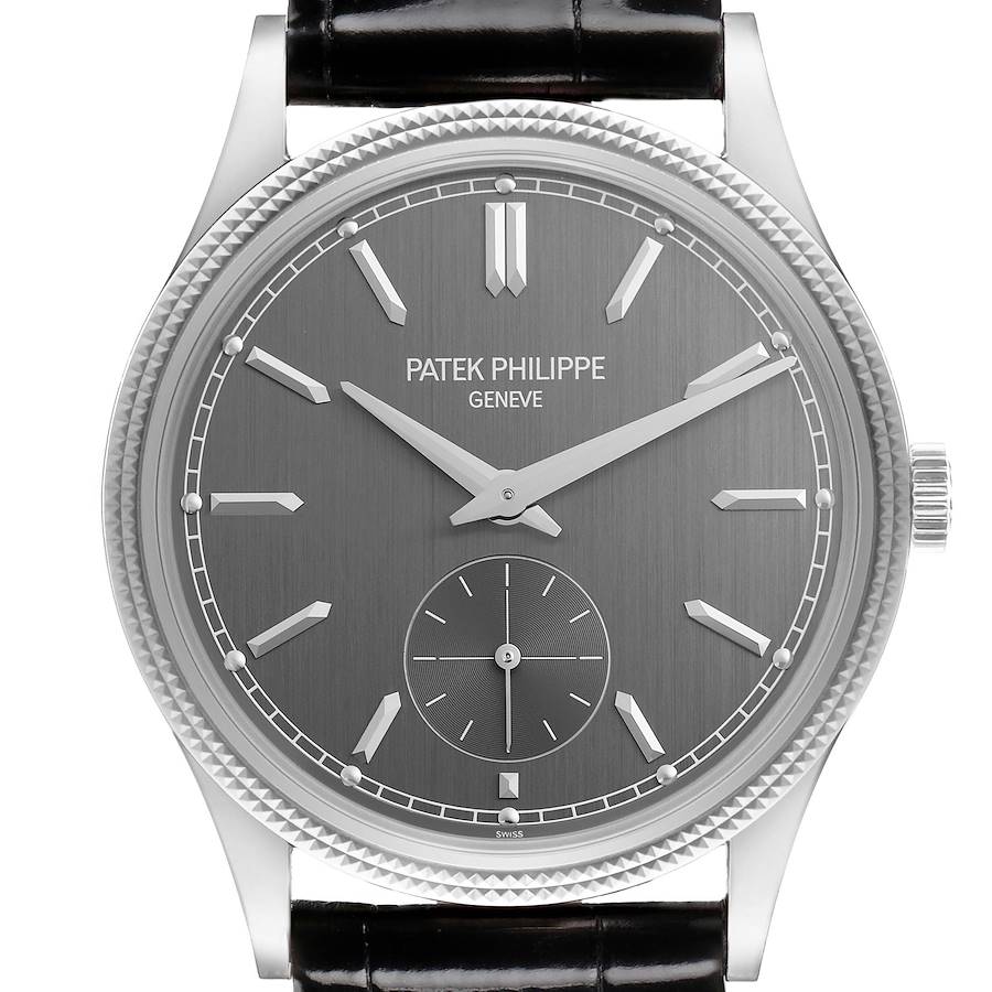 The image shows a Patek Philippe Calatrava watch face straight-on, displaying its dial, hands, bezel, and part of the strap.