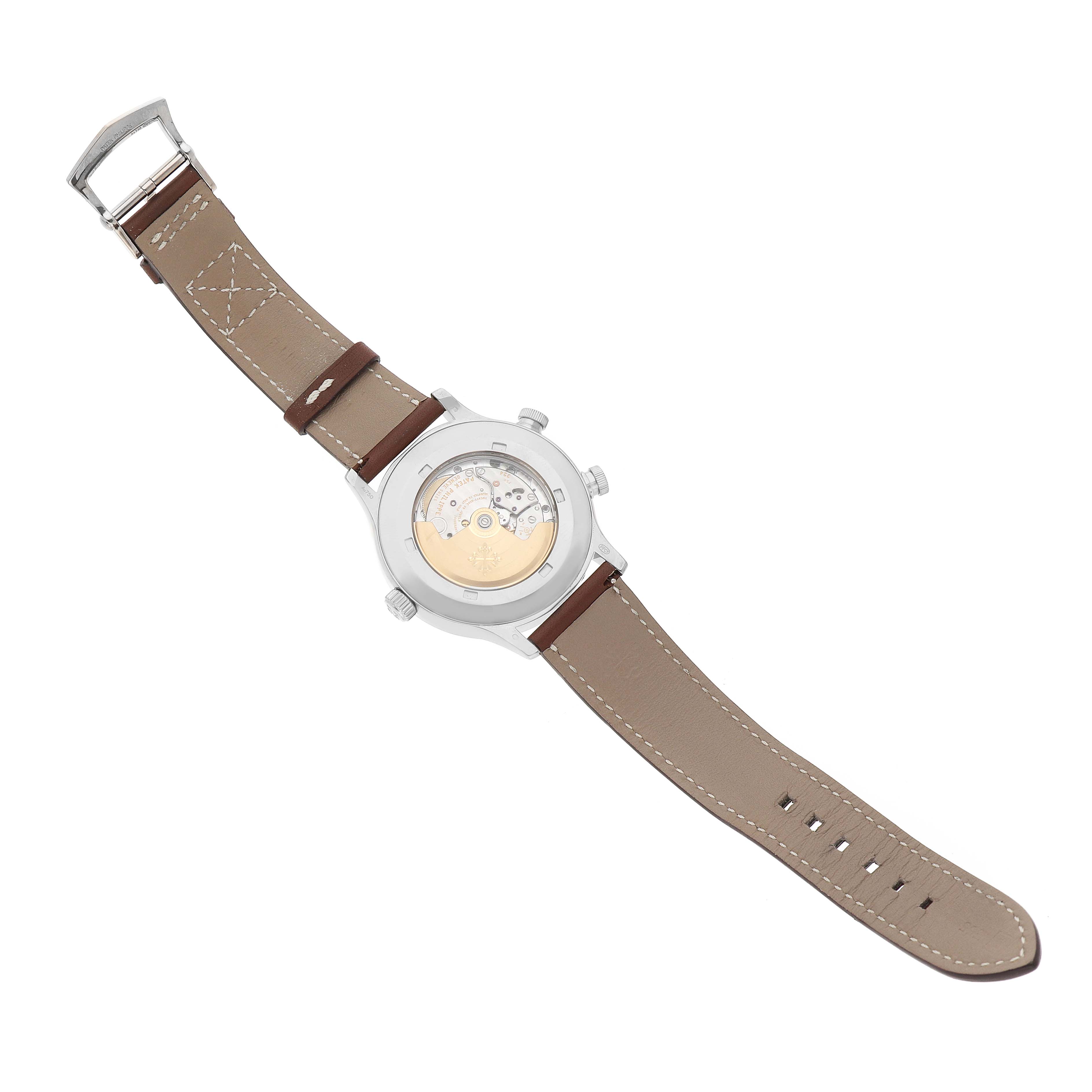 The image shows the back view of a Patek Philippe Calatrava 5524G-001 Men's White Gold Black Dial, displaying its movement and brown leather strap.