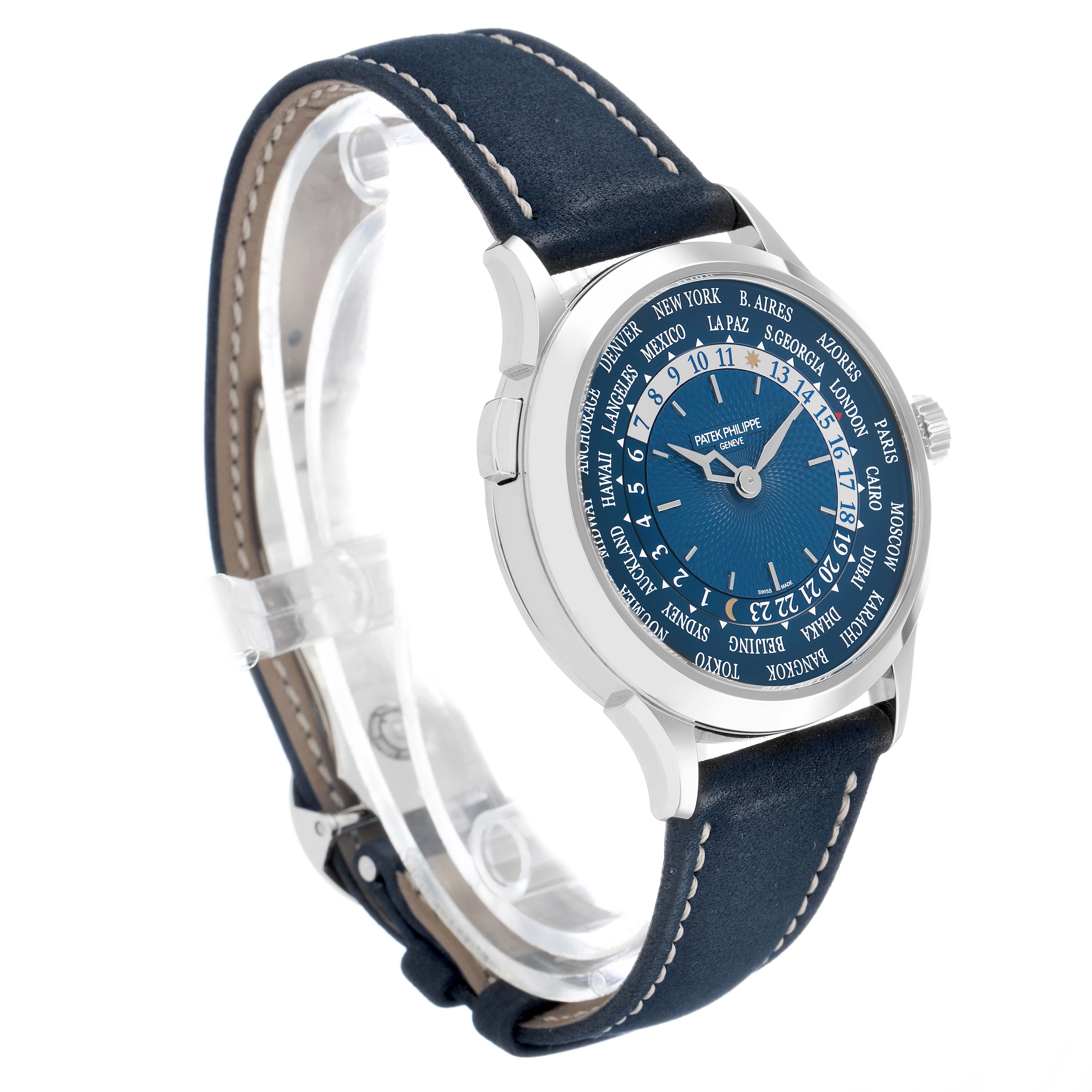 The Patek Philippe Complications 5230P-001 Men's Platinum Blue Dial watch is shown at a three-quarter angle, displaying the dial, bezel, crown, and leather strap.