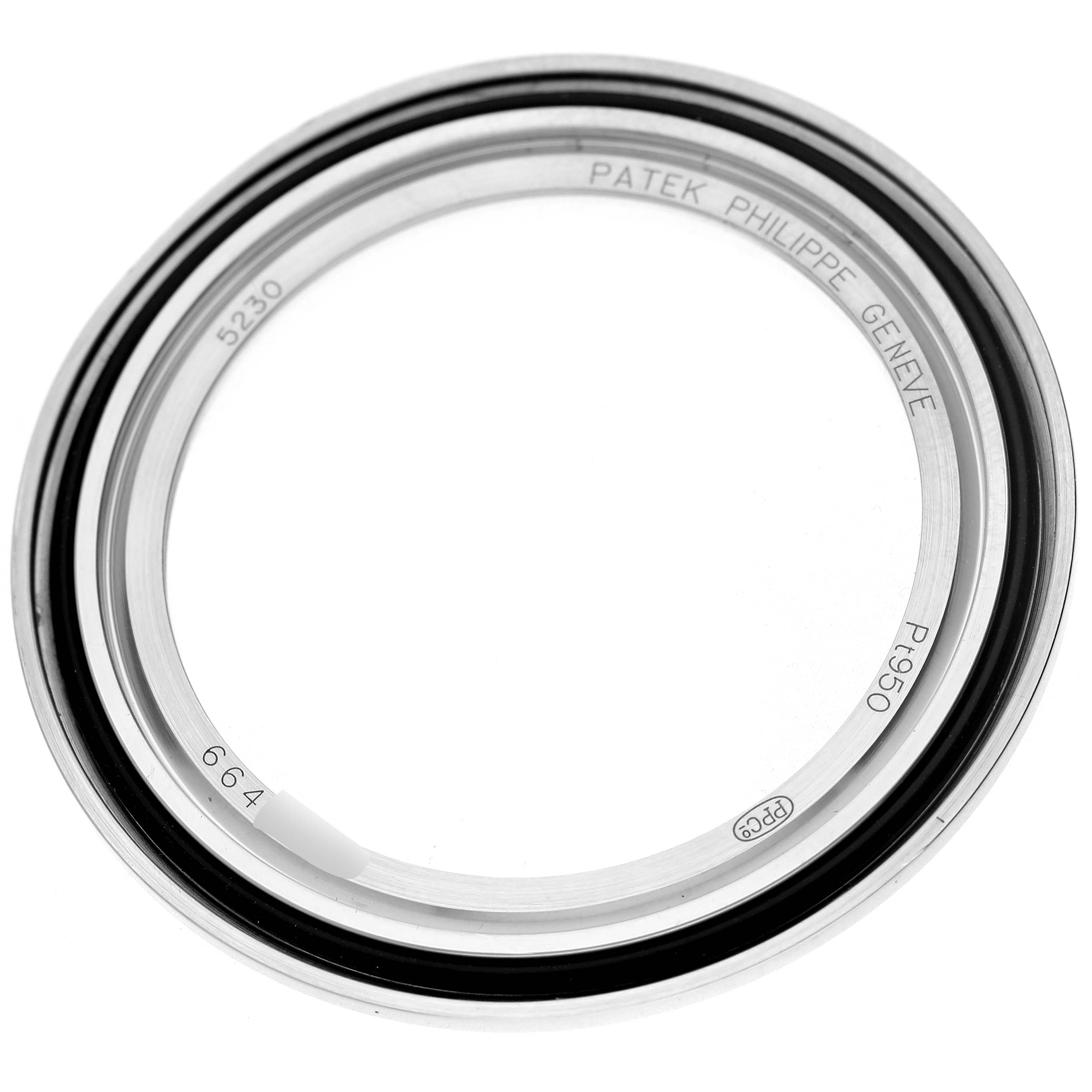 The image shows a top-down view of a silver watch bezel for the Patek Philippe Complications 5230P-001 Men's Platinum Blue Dial model.