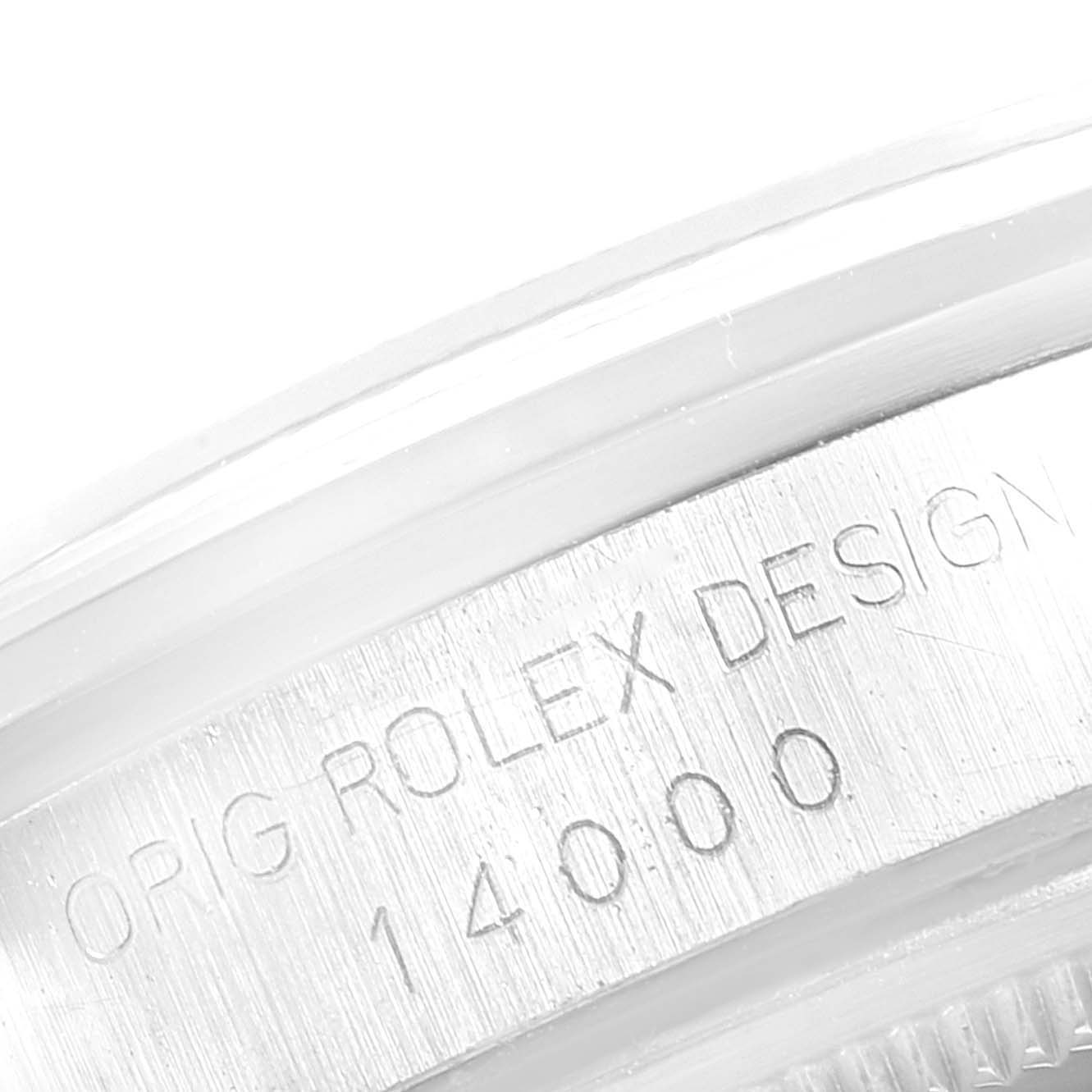 The image shows a close-up of the case side and engraving on a Rolex Air-King 14000 Men's Stainless Steel Grey Dial 14000 Men's Stainless Steel Grey Dial watch.
