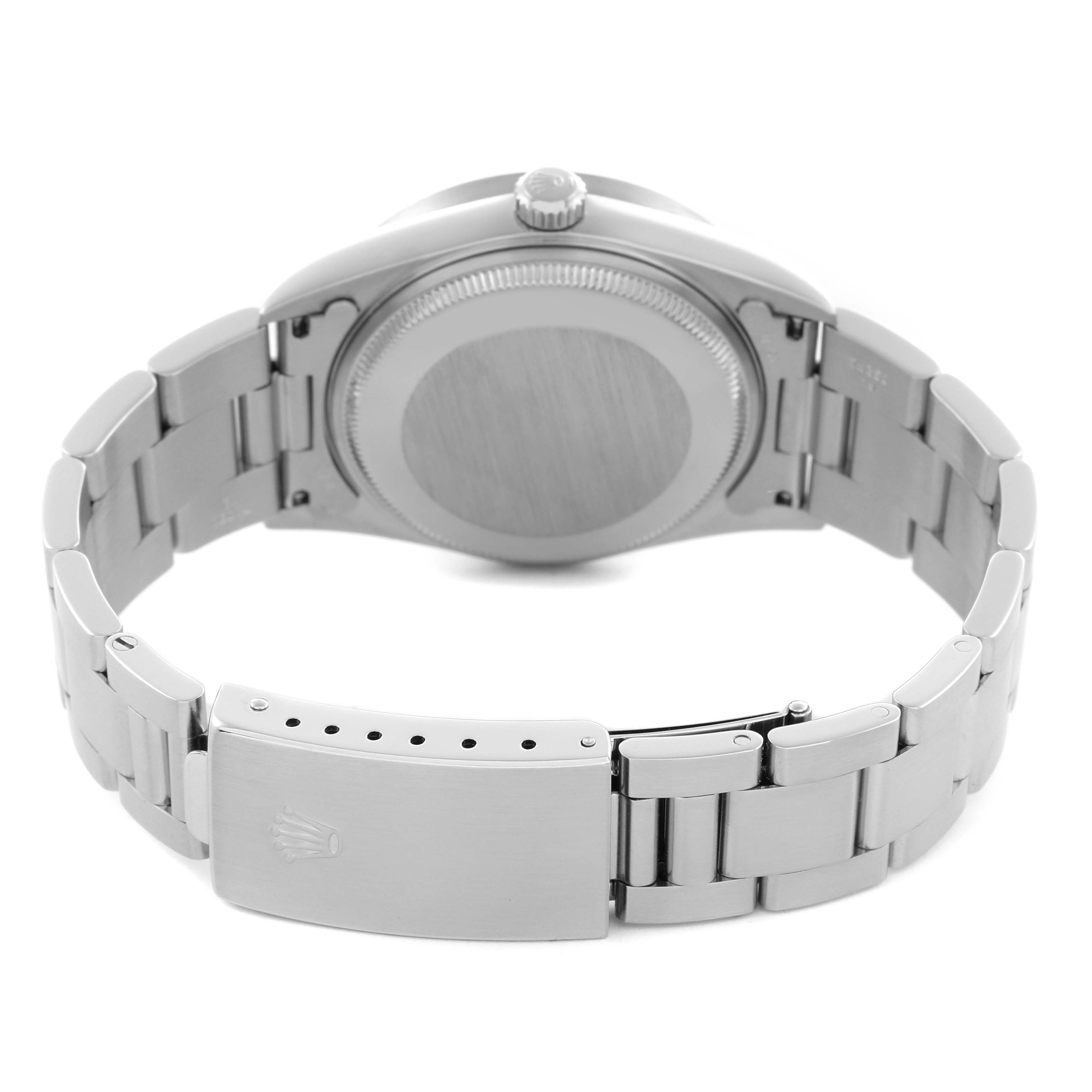 The image shows the back view of a Rolex Air-King 14010 Men's Stainless Steel Pink Dial 14010 Men's Stainless Steel Pink Dial watch, highlighting the case back, bezel, bracelet, and clasp.