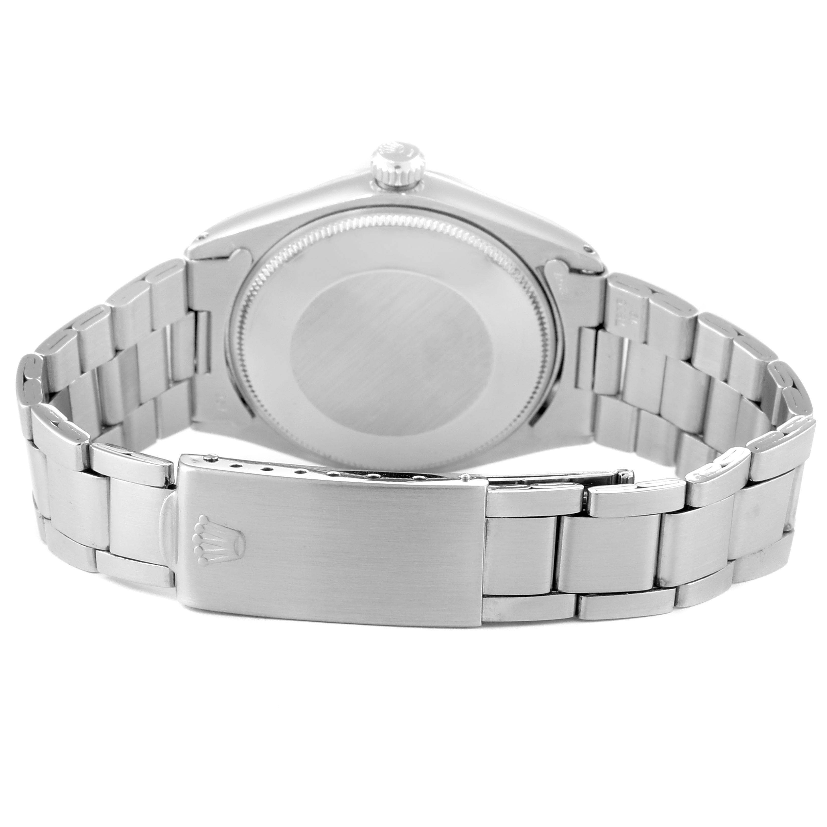 This image shows the back case and bracelet clasp of a Rolex Air-King 5500 Men's Stainless Steel Silver Dial 5500 Men's Stainless Steel Silver Dial watch from a rear angle.