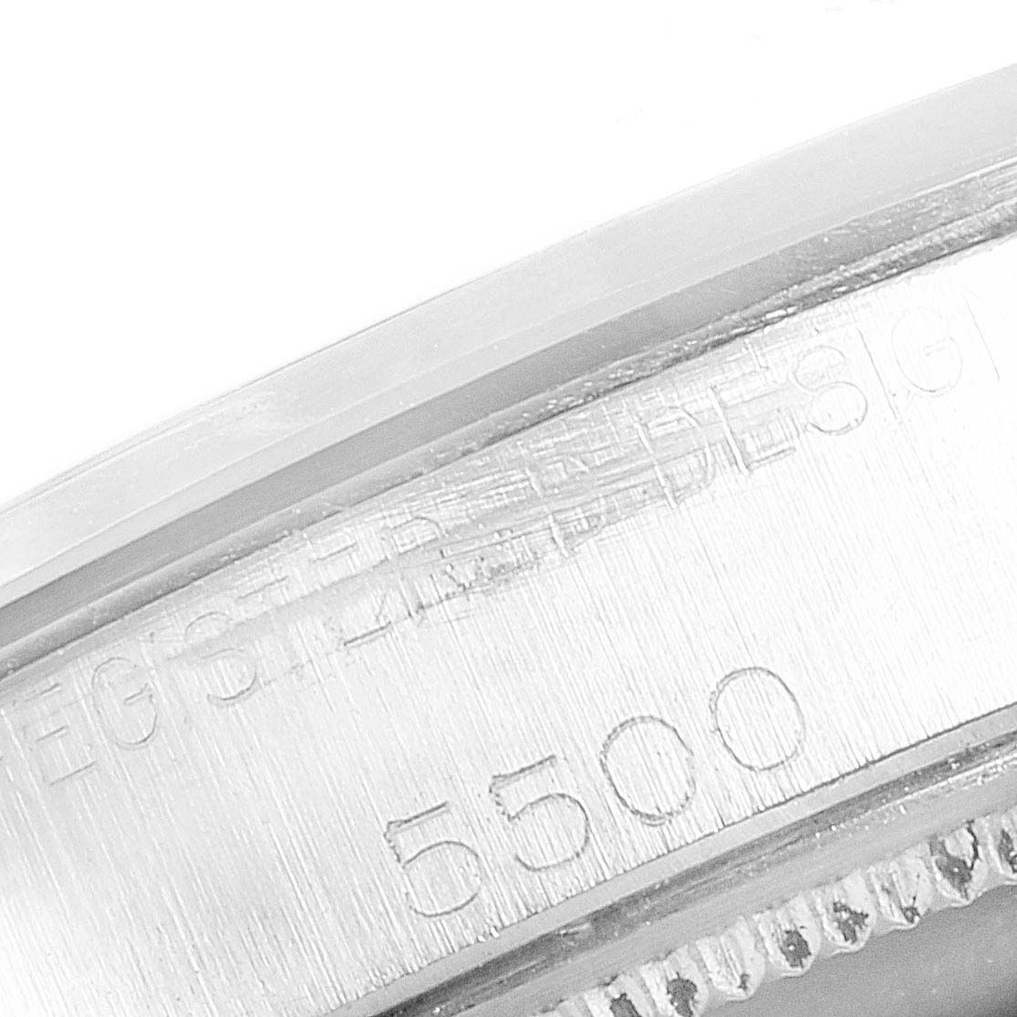 This close-up image shows the case back of the Rolex Air-King 5500 Men's Stainless Steel Silver Dial 5500 Men's Stainless Steel Silver Dial model 5500, featuring engraved details.