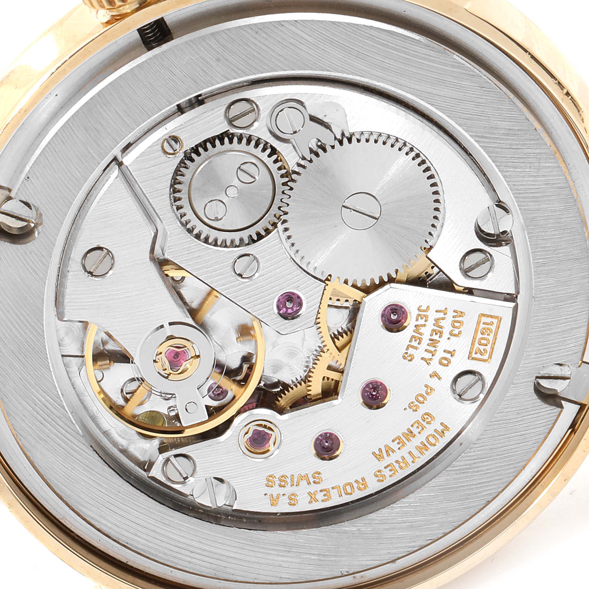 The image shows the intricate movement of the Rolex Cellini 5115 Men's Yellow Gold Silver Dial 5115 Men's Yellow Gold Silver Dial watch viewed from the back.