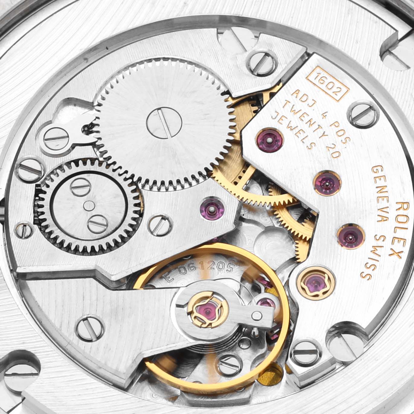 The image shows the inner mechanical movement of the Rolex Cellini 4233/9BIC Men's Steel and Gold (two tone) White Dial 4233/9BIC Men's Steel and Gold (two tone) White Dial watch, focusing on gears, jewels, and inscriptions.