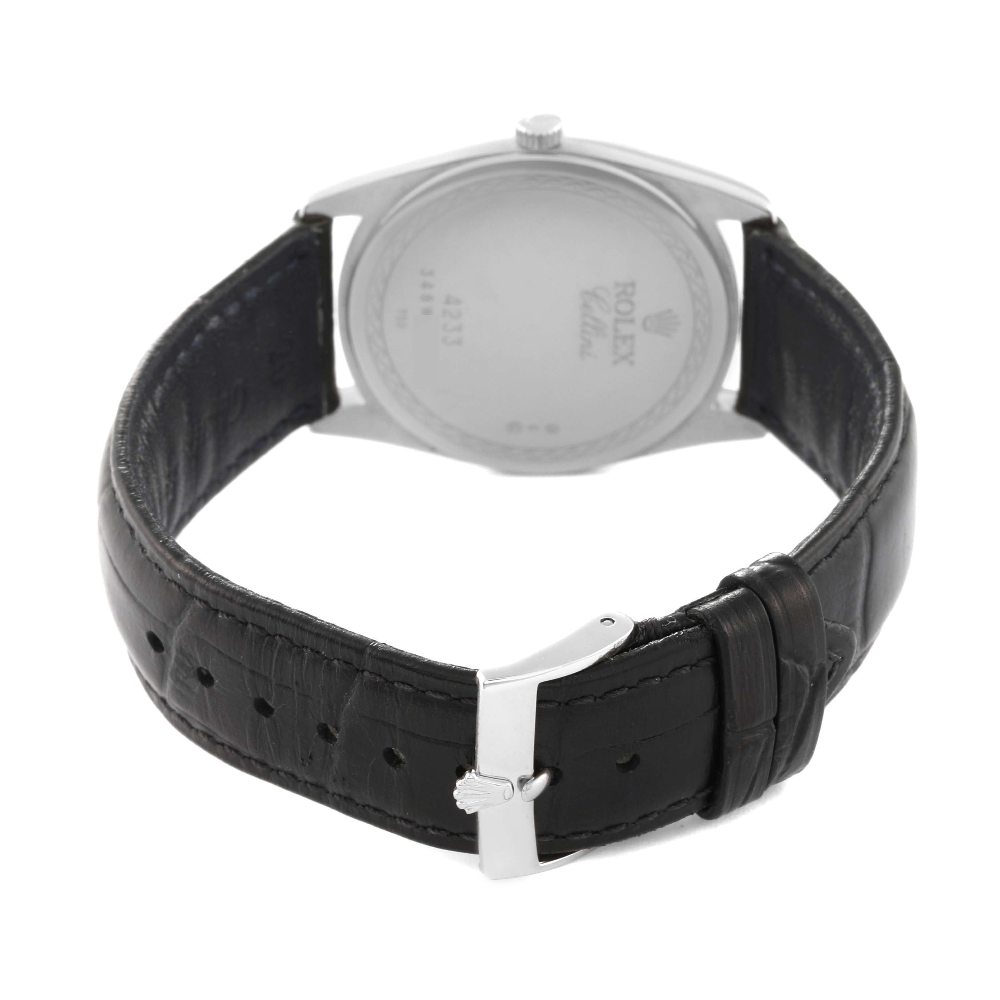 The image shows the back of a Rolex Cellini 4233/9BIC Men's Steel and Gold (two tone) White Dial 4233/9BIC Men's Steel and Gold (two tone) White Dial watch, focusing on the case back, leather strap, and buckle.