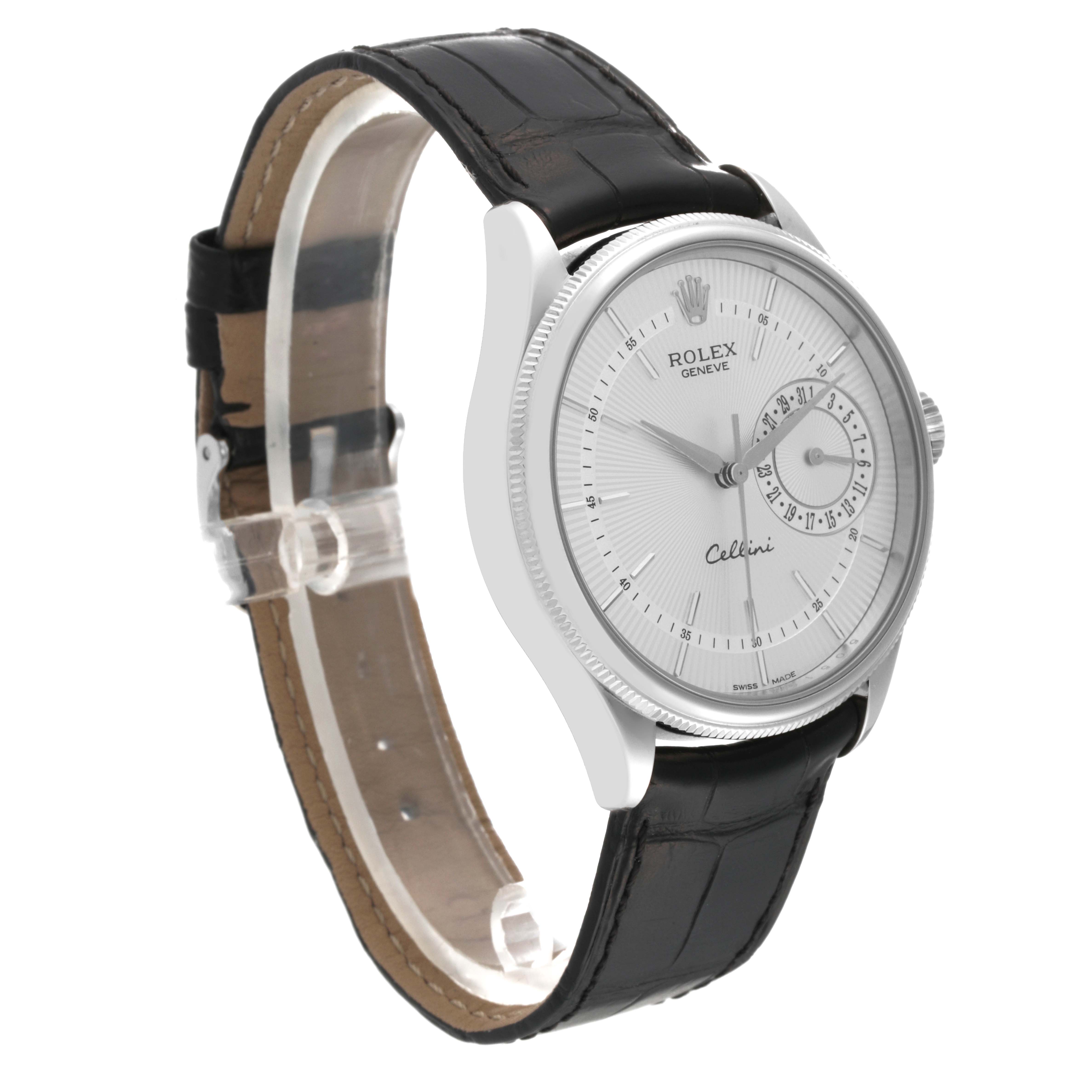 The Rolex Cellini 50519 Men's White Gold Silver Dial 50519 Men's White Gold Silver Dial watch is shown at a slight angle, displaying its round dial, silver case, leather strap, and detailing on the face.
