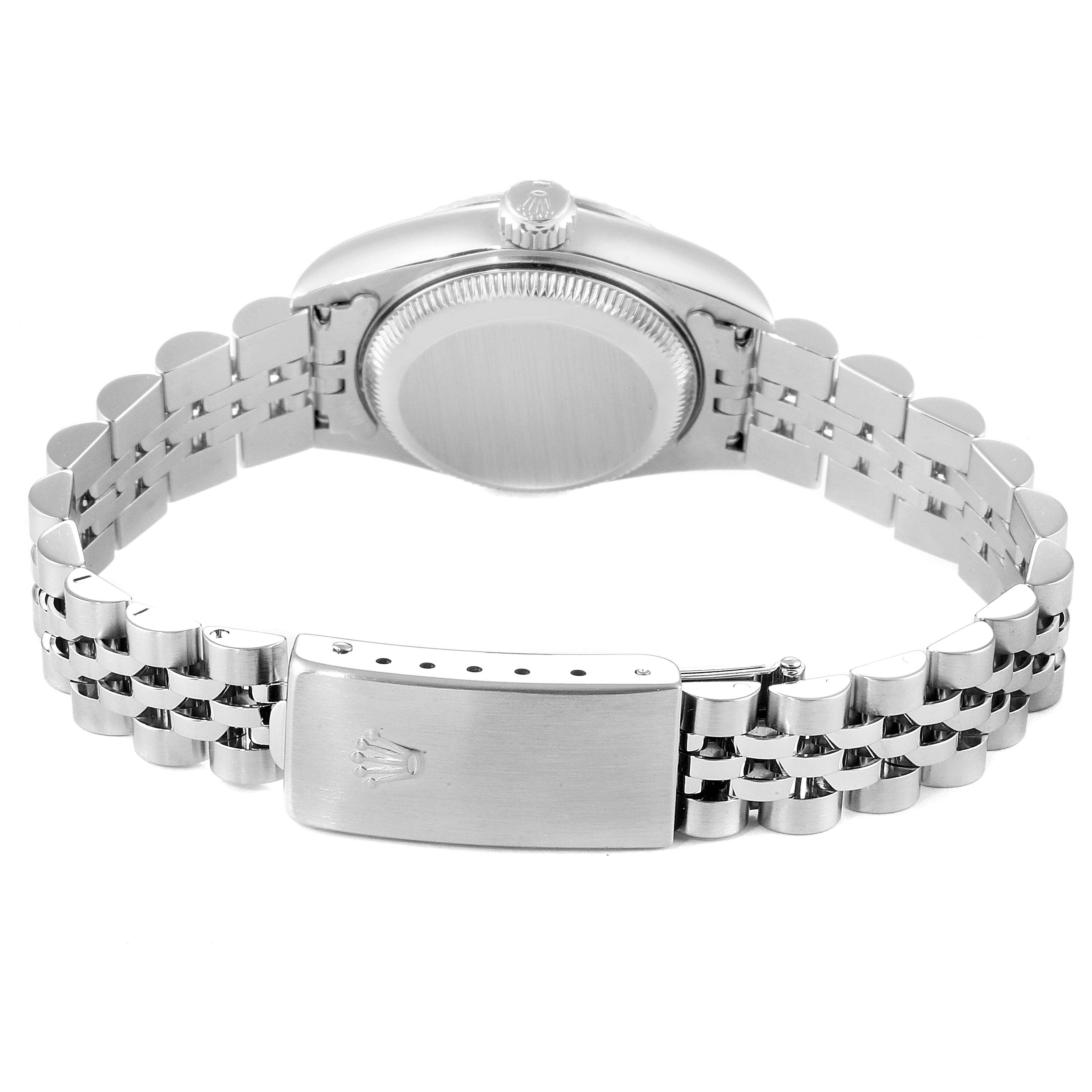 This image shows the back of a Rolex Datejust 79174 Women
s Stainless Steel Silver Dial 79174 Women
s Stainless Steel Silver Dial watch, highlighting its case back and Jubilee bracelet clasp.
