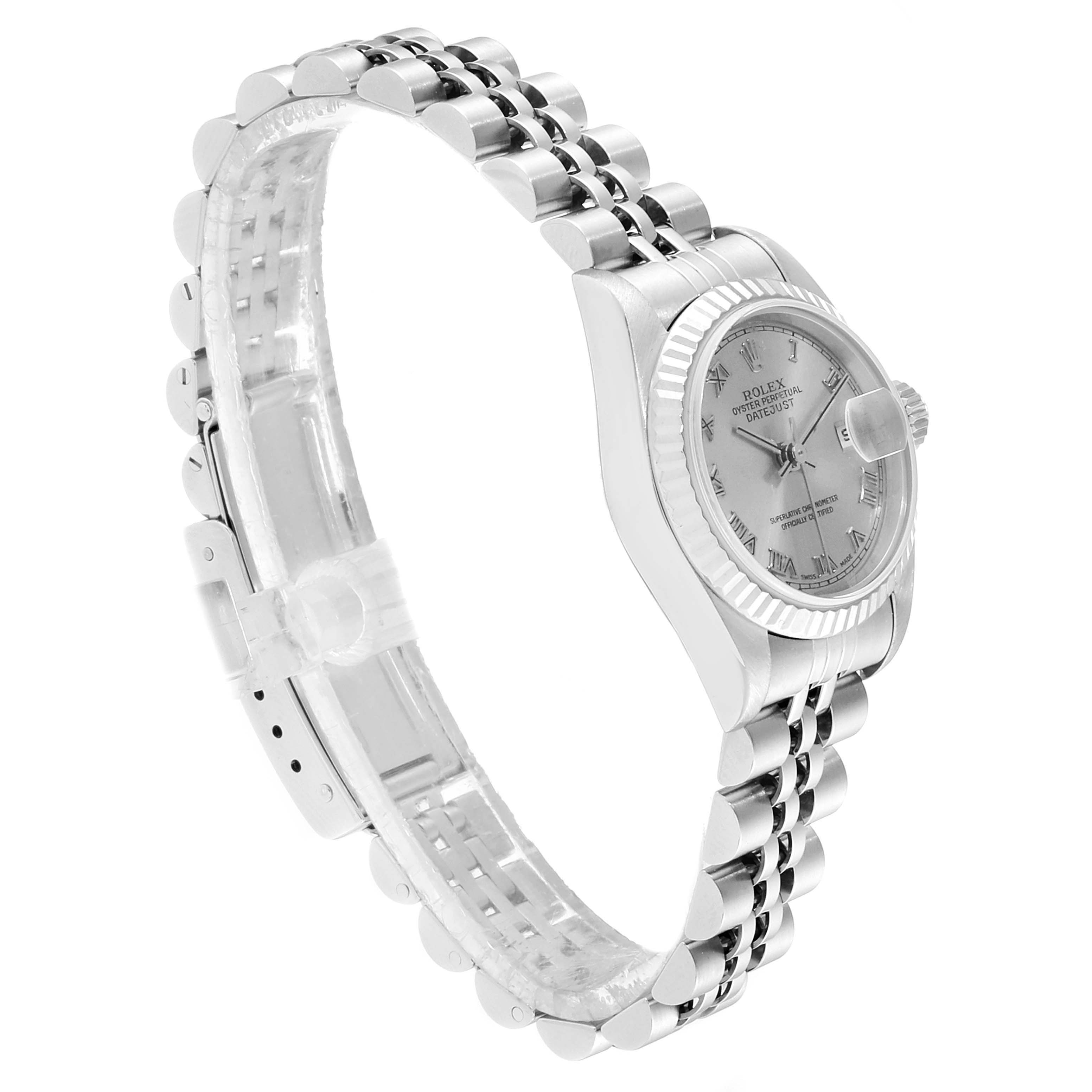 This image shows a side view of the Rolex Datejust 79174 Women
s Stainless Steel Silver Dial 79174 Women
s Stainless Steel Silver Dial watch, highlighting the watch face, bezel, and bracelet.