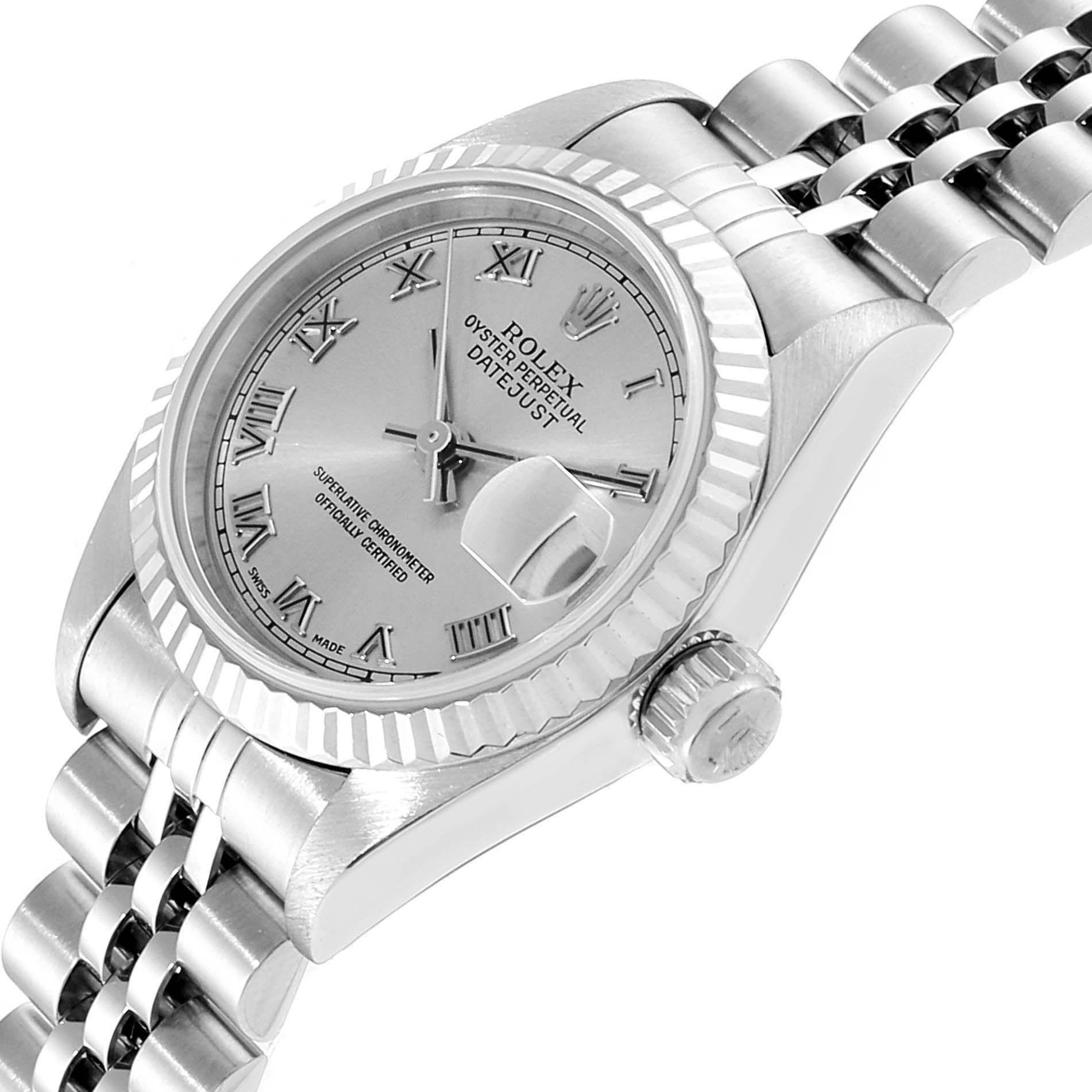 The image shows a close-up angle of the Rolex Datejust 79174 Women
s Stainless Steel Silver Dial 79174 Women
s Stainless Steel Silver Dial watch, displaying its face, bezel, crown, and part of the bracelet.