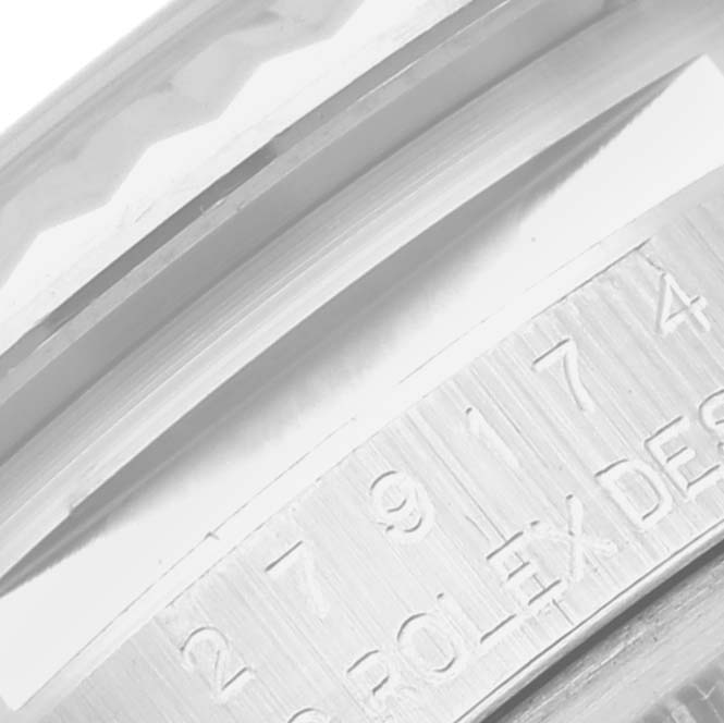 This image shows a close-up of the serial number engraving on the bezel of a Rolex Datejust 279174 Women's Stainless Steel Grey Dial 279174 Women's Stainless Steel Grey Dial watch.