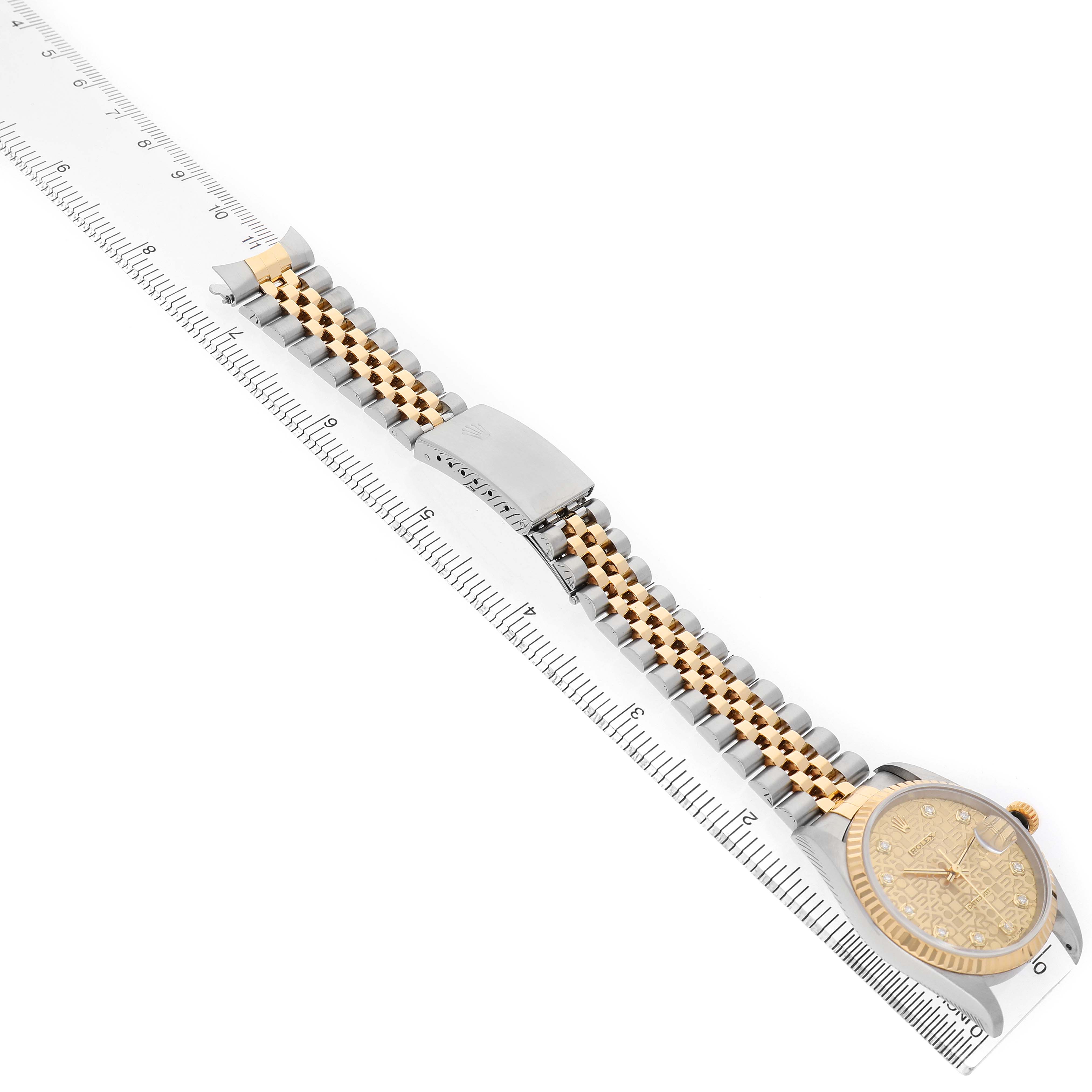 The Rolex Datejust 16233 Men's Stainless Steel Champagne Dial watch is shown from a diagonal top view, highlighting the dial, bracelet, and clasp.