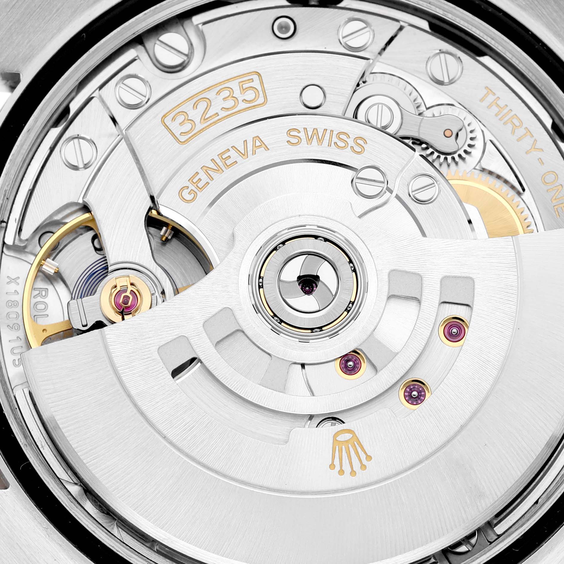 This is a close-up view of the movement inside a Rolex Datejust 126231 Men's Steel and Gold (two tone) Grey Dial 126231 Men's Steel and Gold (two tone) Grey Dial, highlighting its intricate mechanical parts.