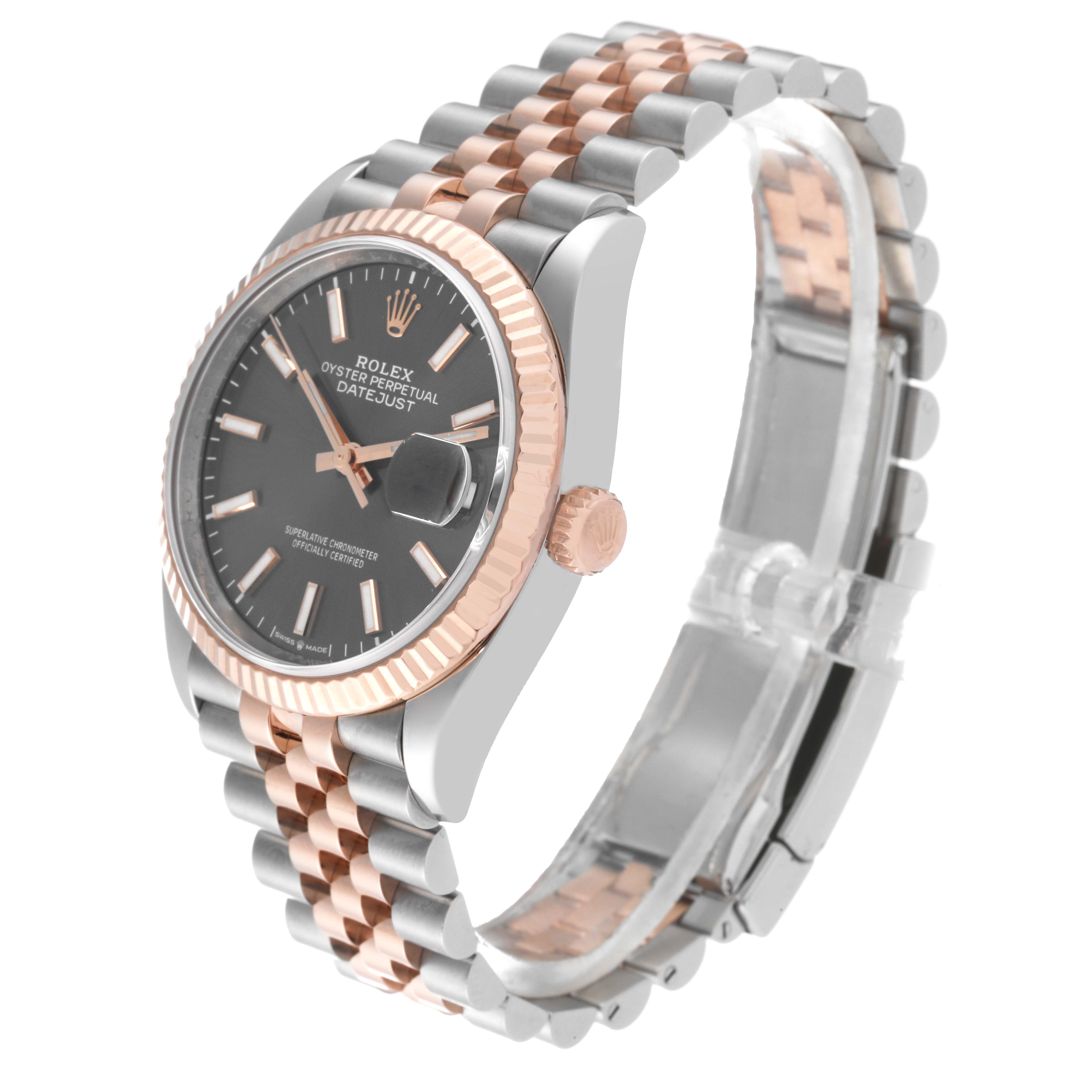 The image shows a Rolex Datejust 126231 Men's Steel and Gold (two tone) Grey Dial 126231 Men's Steel and Gold (two tone) Grey Dial watch at an angle highlighting the dial, two-tone bracelet, crown, and fluted bezel.