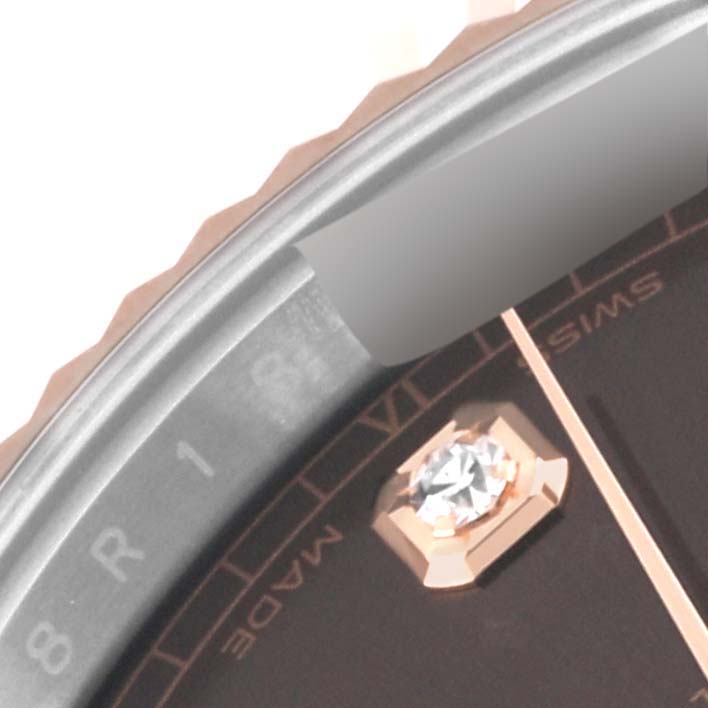 The image shows a close-up of the dial, diamond marker, and part of the bezel of a Rolex Datejust 41 126331 Men
s Steel and Gold (two tone) Brown Dial 126331 Men
s Steel and Gold (two tone) Brown Dial watch.