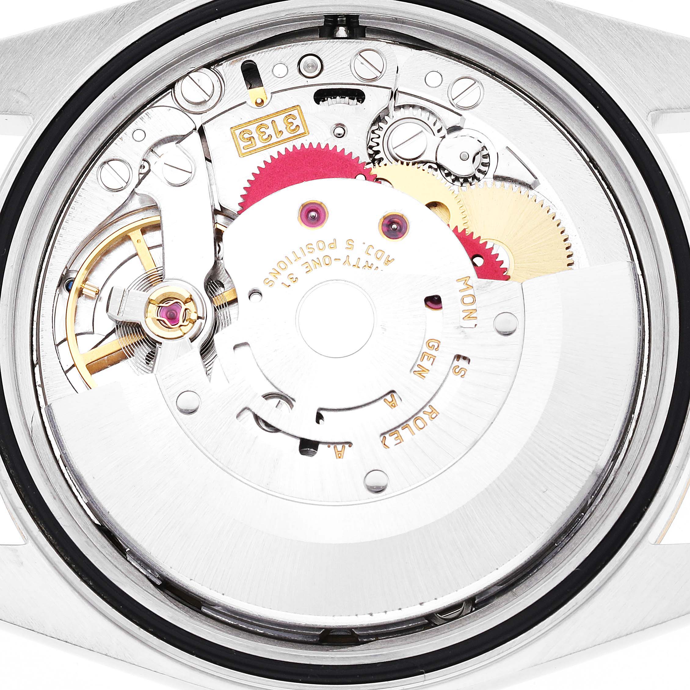 The image shows the intricate internal mechanics of a Rolex Datejust 16233 Men's Steel and Gold (two tone) Champagne Dial 16233 Men's Steel and Gold (two tone) Champagne Dial watch, viewed from the back without the case cover.