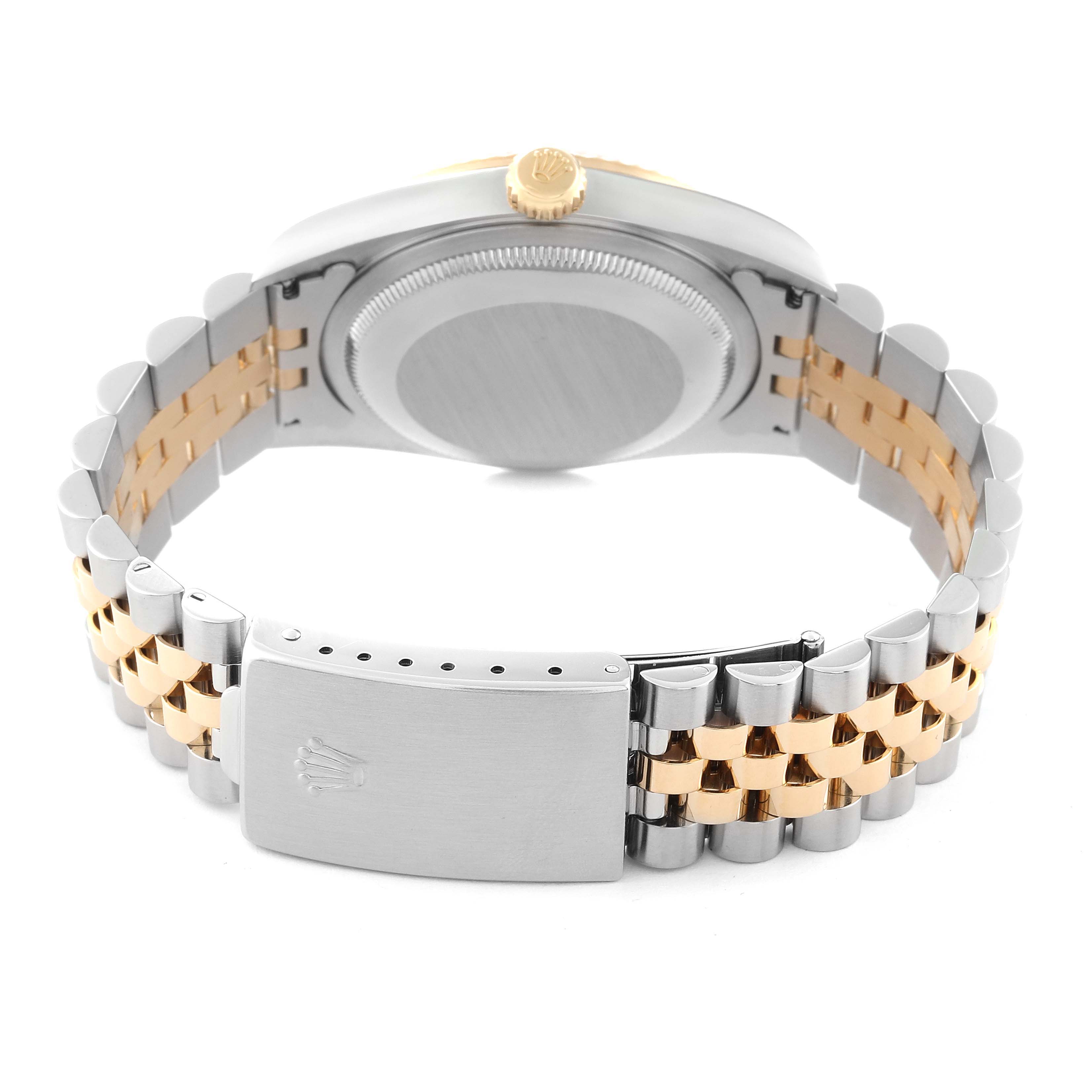 This image shows the back side of a Rolex Datejust 16233 Men's Steel and Gold (two tone) Champagne Dial 16233 Men's Steel and Gold (two tone) Champagne Dial watch, highlighting the case back, crown, and two-tone bracelet with the clasp.
