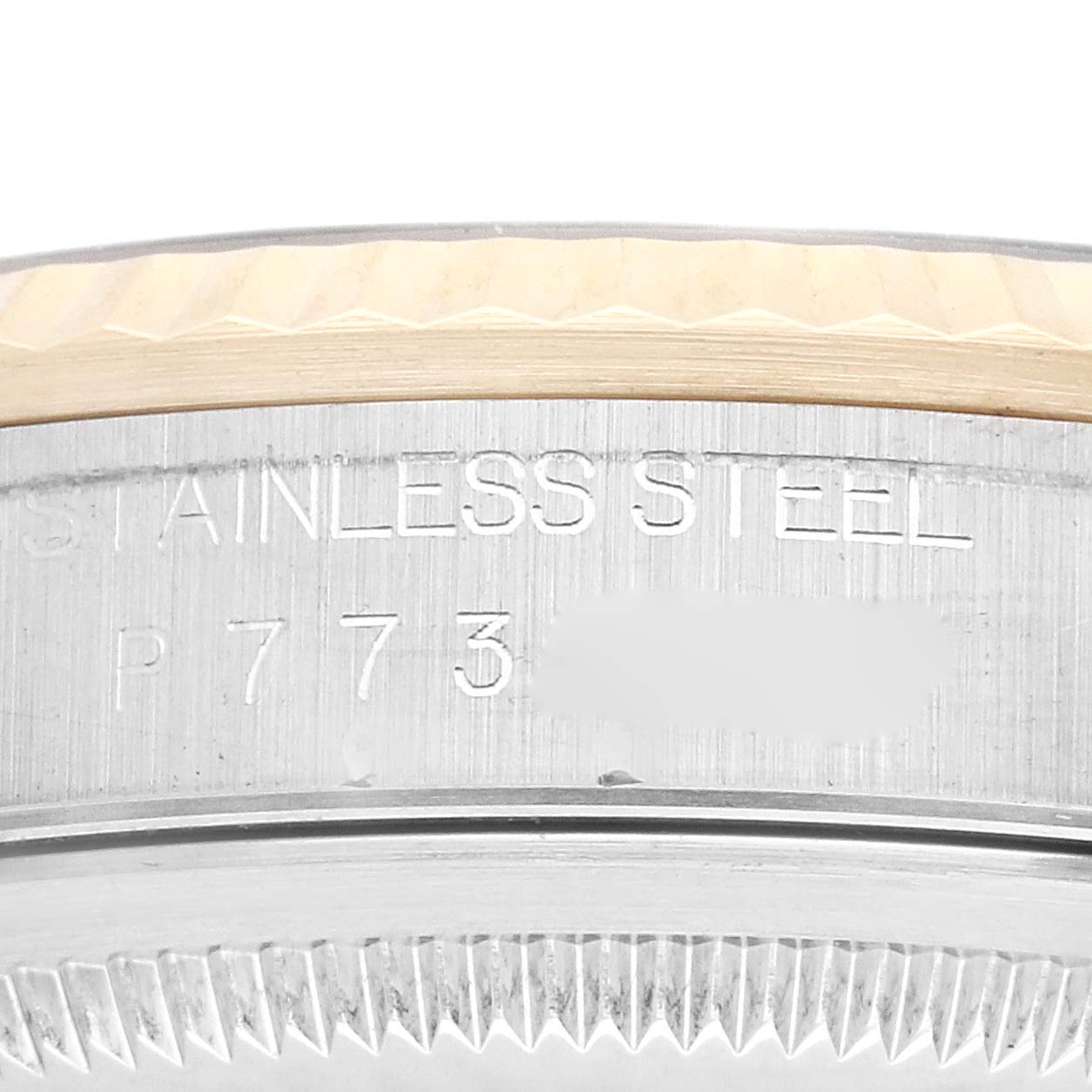 This image shows a close-up of the case side of a Rolex Datejust 16233 Men's Steel and Gold (two tone) Champagne Dial 16233 Men's Steel and Gold (two tone) Champagne Dial, highlighting the stainless steel and part of the serial number.