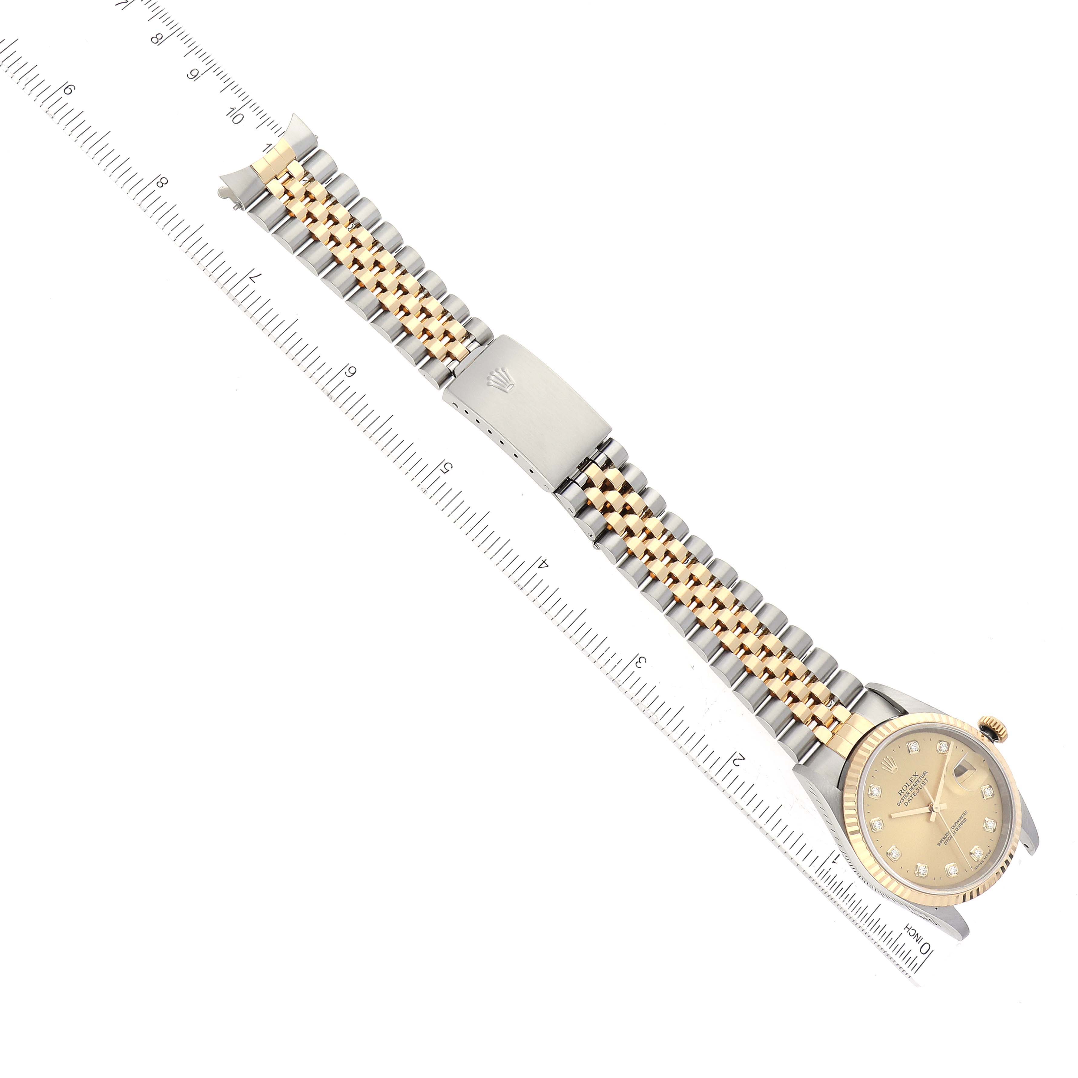 This Rolex Datejust 16233 Men's Steel and Gold (two tone) Champagne Dial 16233 Men's Steel and Gold (two tone) Champagne Dial watch is shown from a top-down view, displaying its face, bracelet, and clasp.