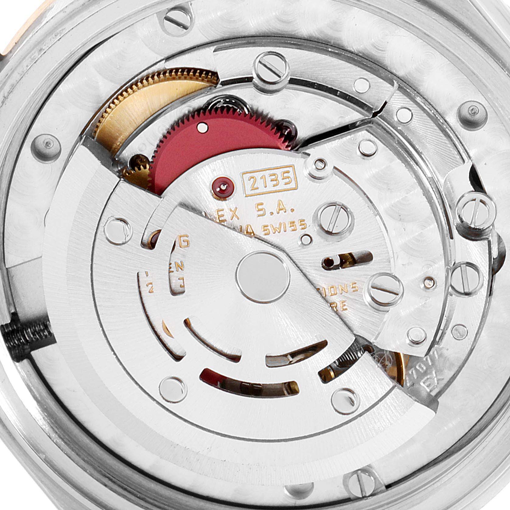 This image shows the internal mechanism of a Mid-Size Rolex watch from an overhead angle.