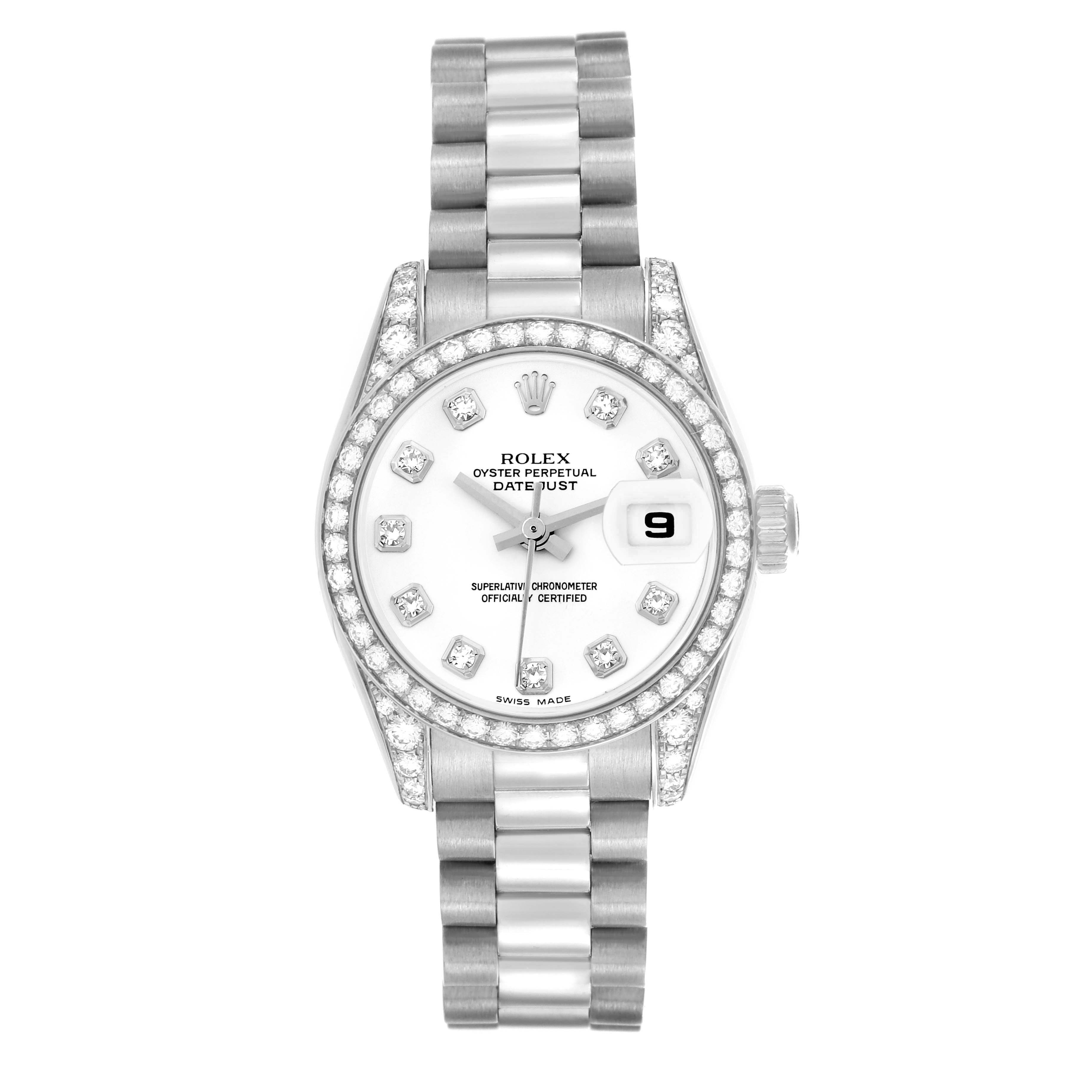 The Rolex President 179159 Women's White Gold White Dial 179159 Women's White Gold White Dial model is shown from a top-down angle, highlighting its diamond bezel, dial, and bracelet.