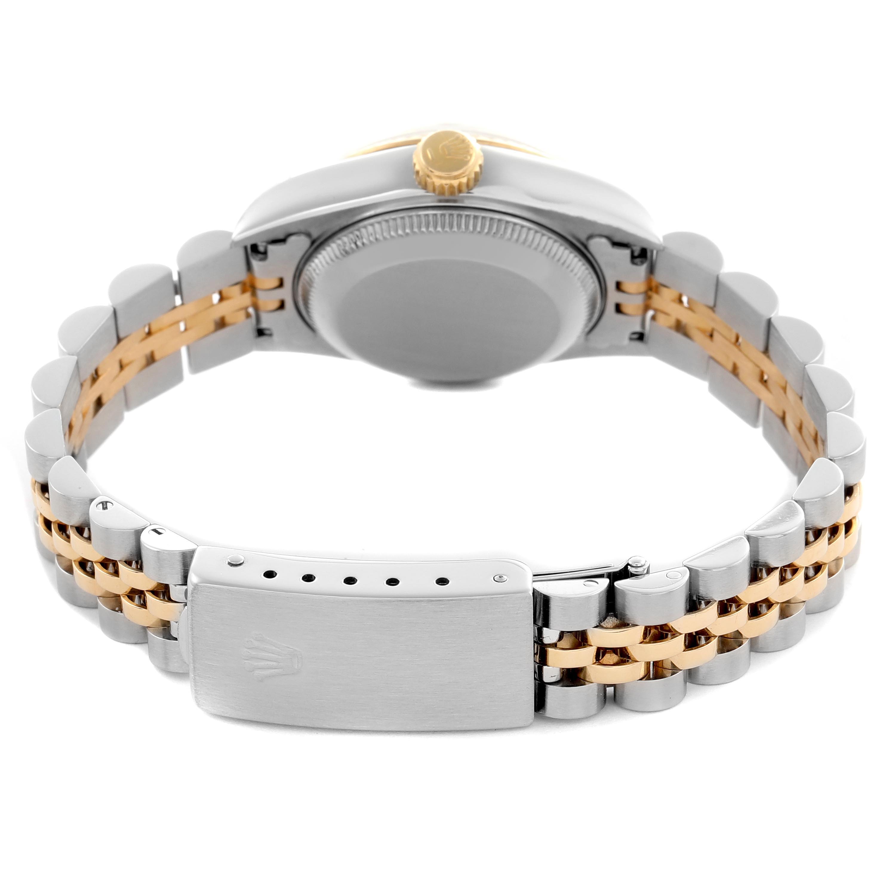 The Rolex Datejust 69173 Women's Steel and Gold (two tone) Silver Dial 69173 Women's Steel and Gold (two tone) Silver Dial watch is shown from the back, highlighting the case, crown, and two-tone bracelet with clasp.