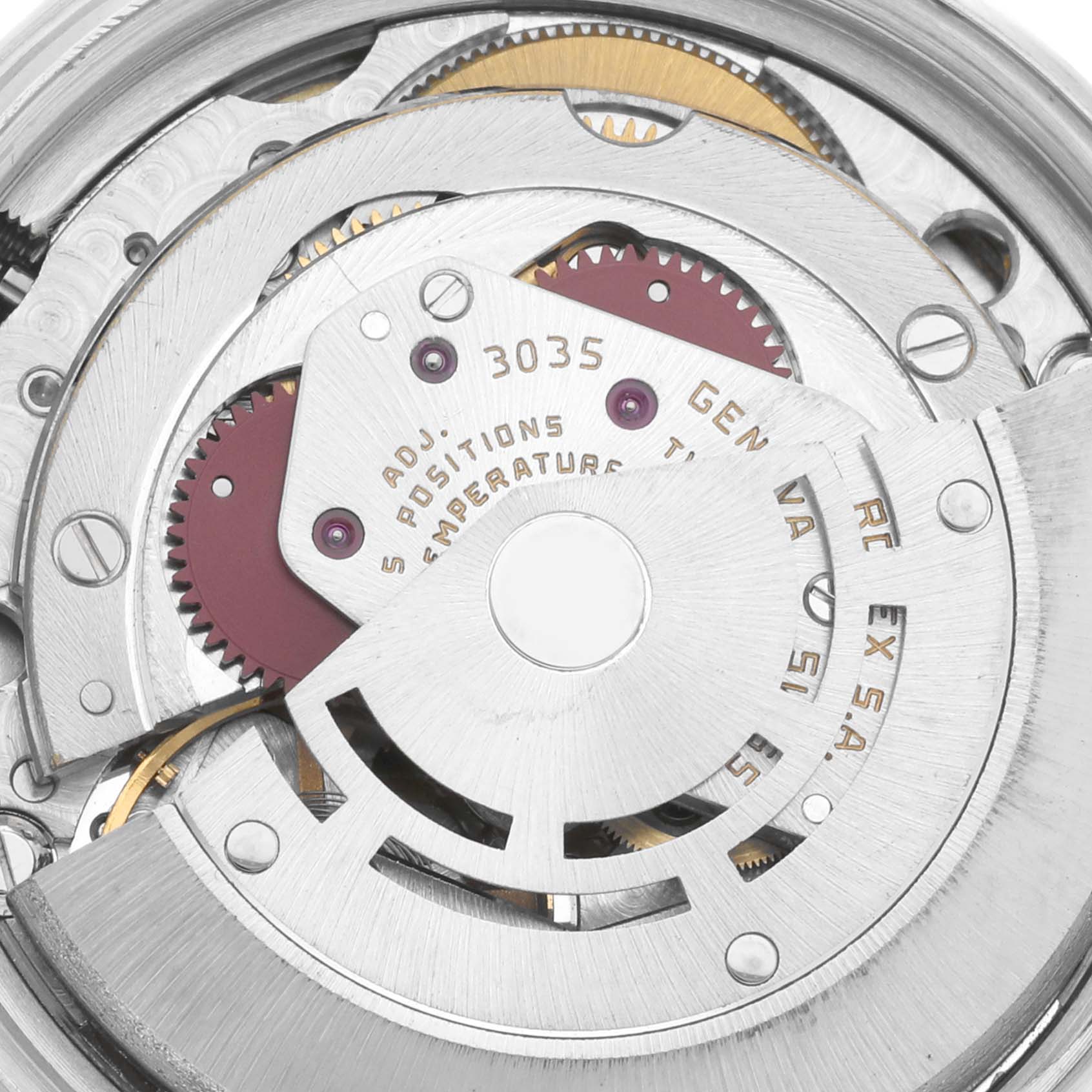 The image displays a close-up view of the internal mechanical parts of the Vintage Collection Rolex watch.
