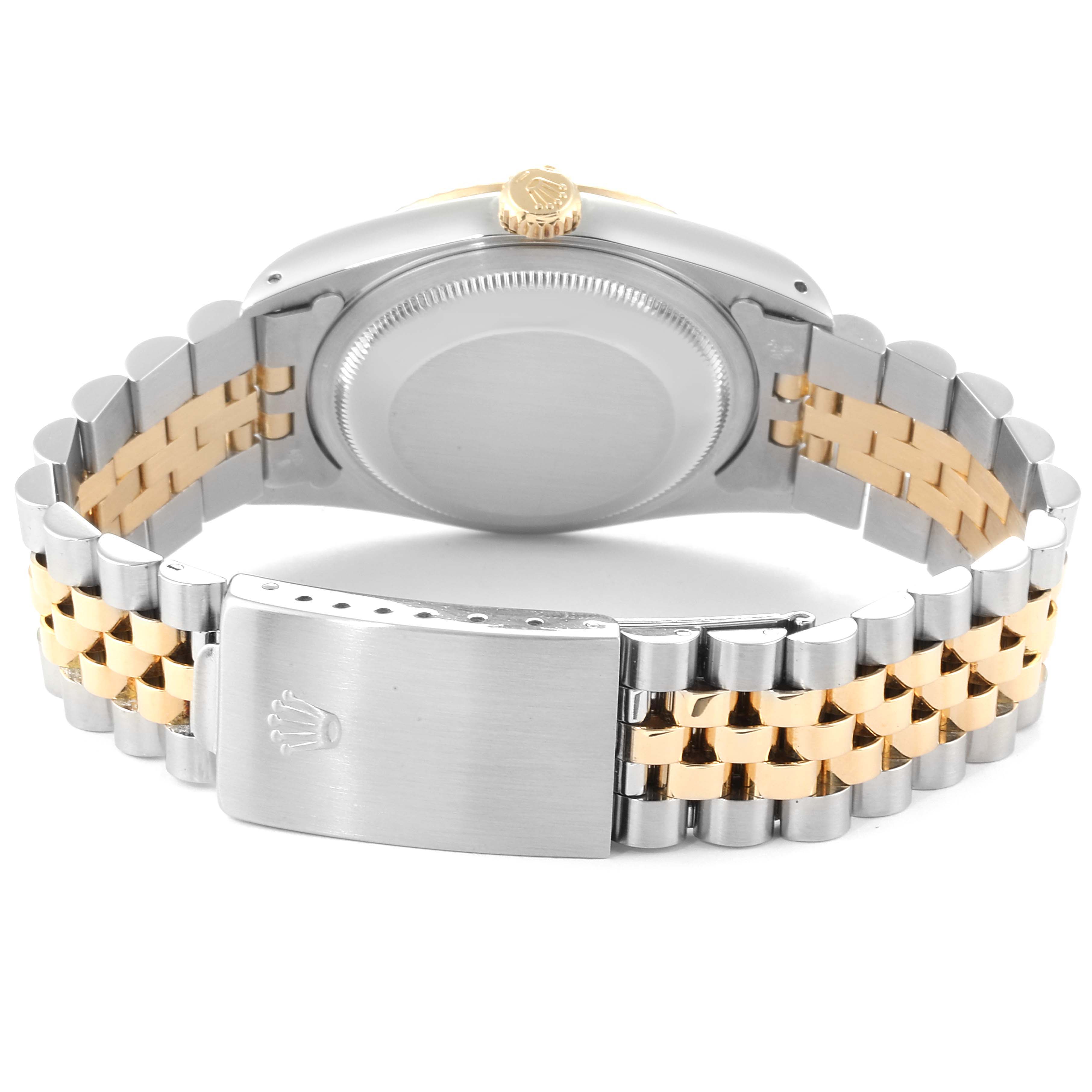 This image shows the back of a Rolex Datejust 16233 Men
s Steel and Gold (two tone) Black Dial 16233 Men
s Steel and Gold (two tone) Black Dial watch, highlighting its two-tone bracelet and clasp.