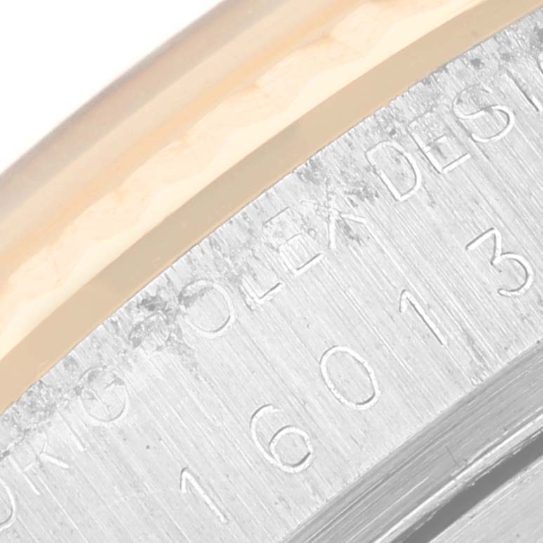 This image shows a close-up of the engraved model number and "ROLEX DESIGN" text on the case of a Rolex Vintage Collection 16013 Men's Steel and Gold (two tone) Champagne Dial 16013 Men's Steel and Gold (two tone) Champagne Dial watch.
